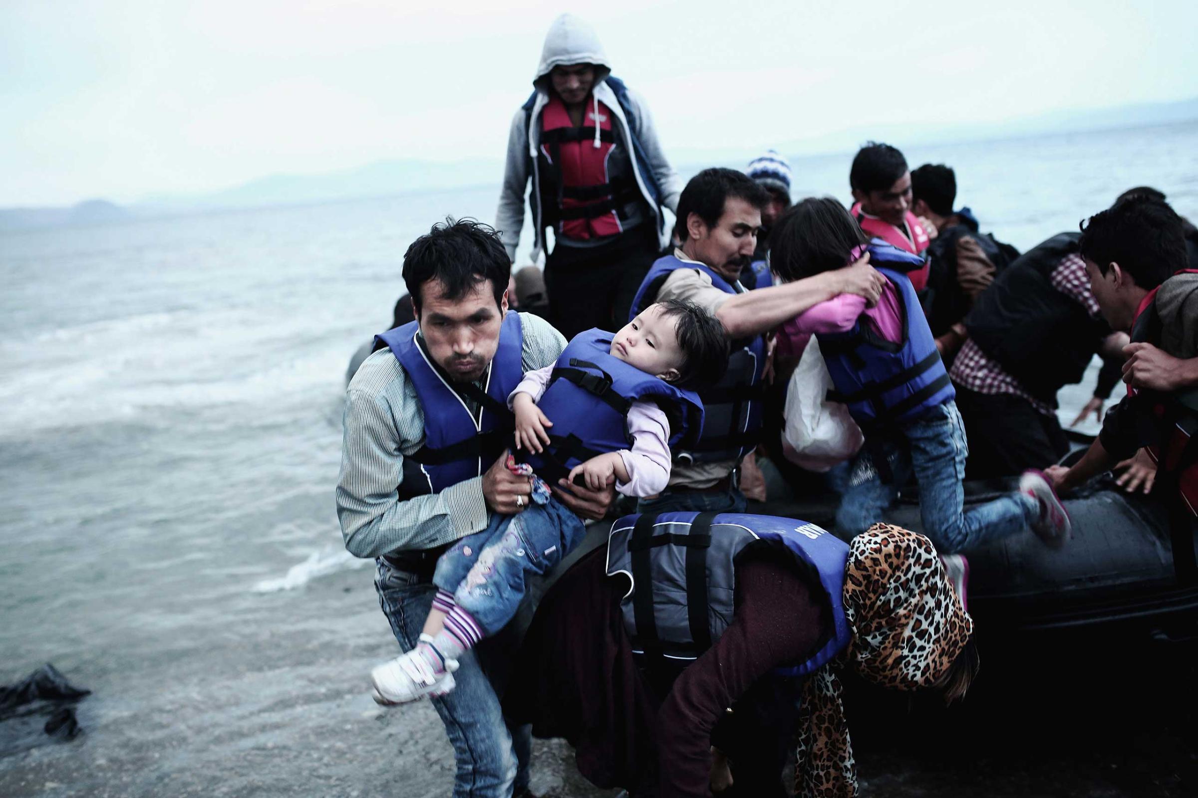 Professional Current Affairs First Place. In Search of the European Dream. Afghan migrants arrive on a beach on the Greek island of Kos, after crossing a part of the Aegean Sea between Turkey and Greece, May 27, 2015.