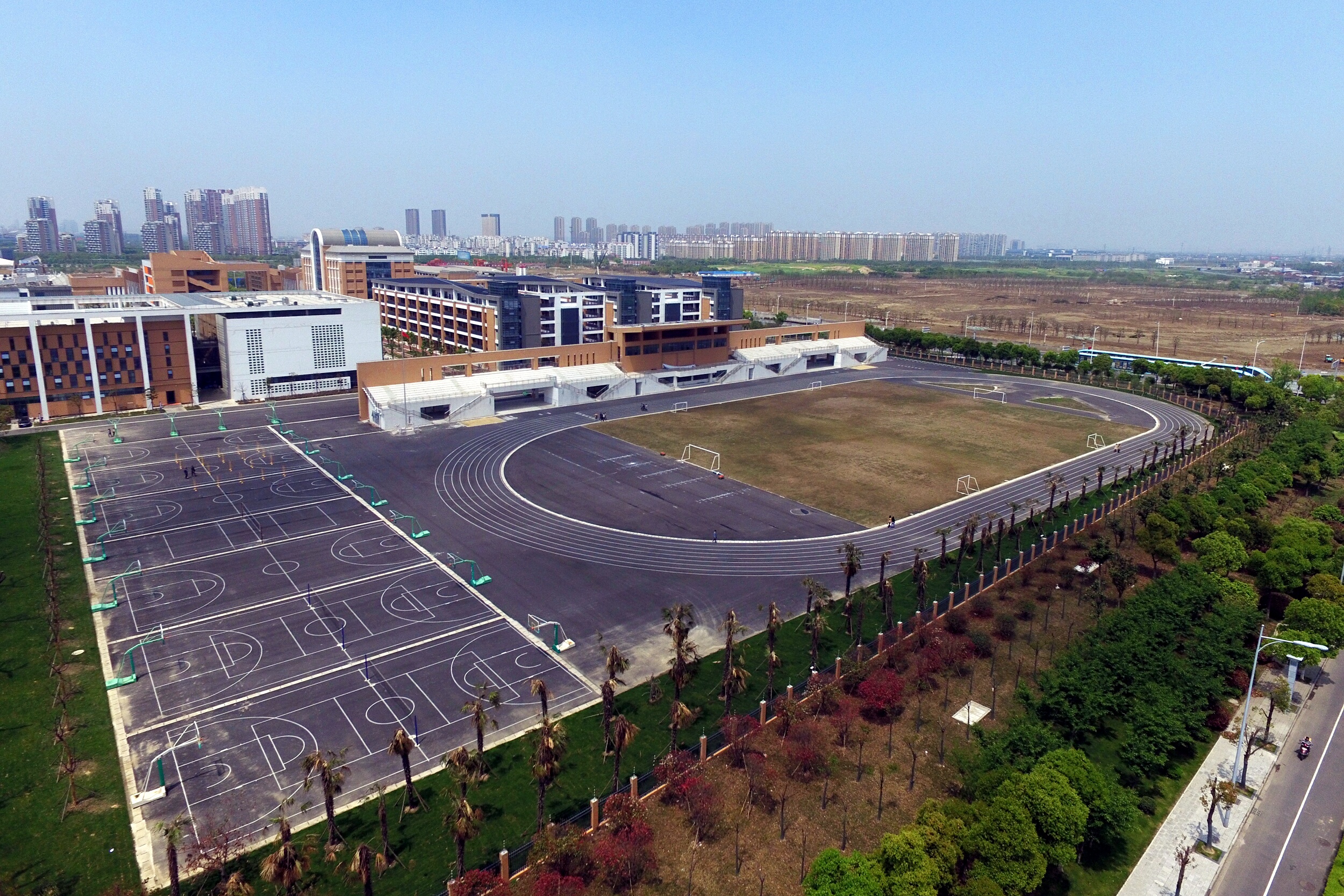 A view of the new campus of Changzhou Foreign Languages School near a toxic site in Changzhou city, China's Jiangsu province, on April 18, 2016 (Stringer/Imaginechina/AP)