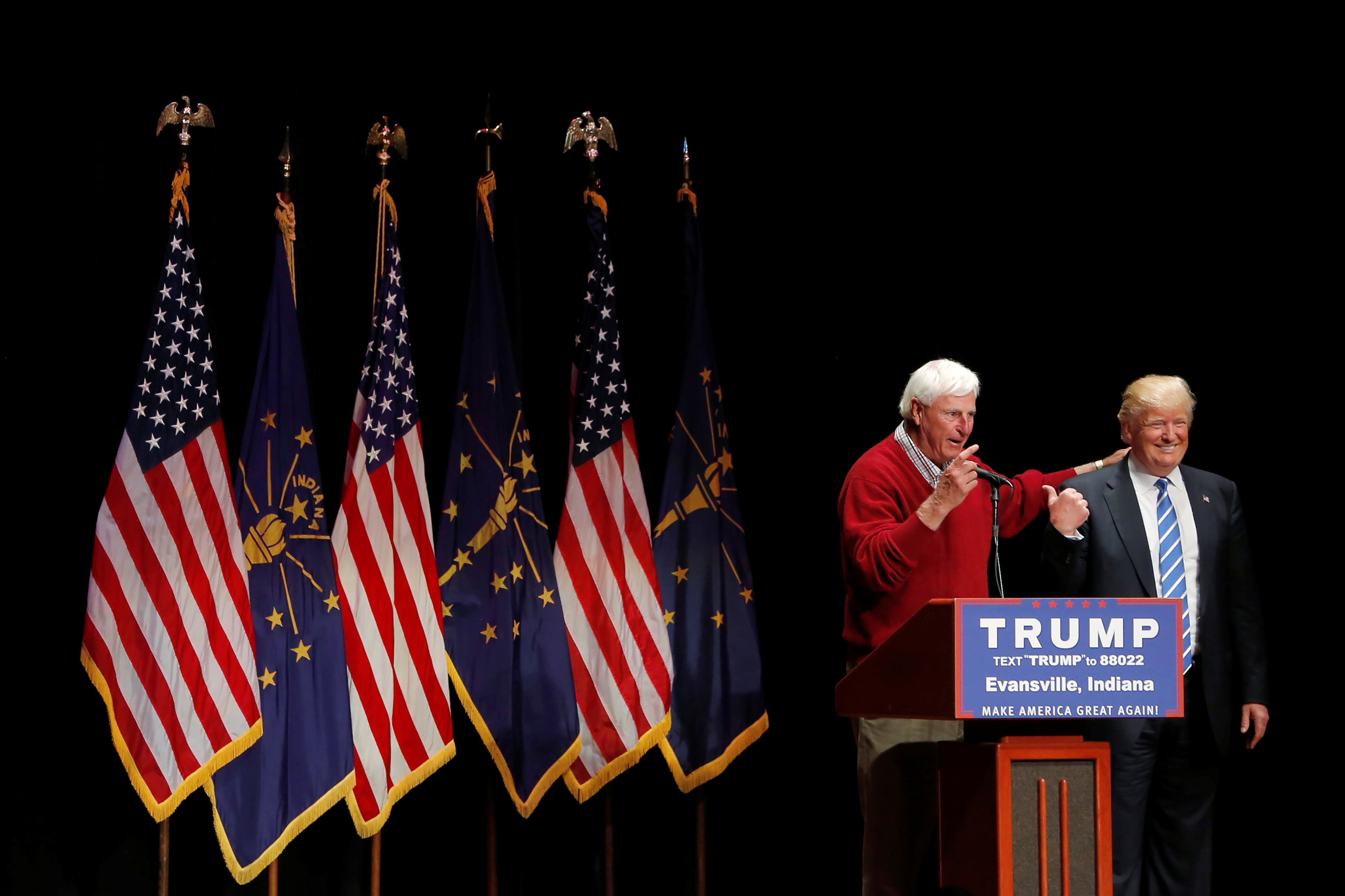 Republican presidential candidate Donald Trump is joined on stage by former Indiana University basketball coach Bob Knight at a campaign event at the Old National Events Plaza in Evansville, Indiana, on April 28, 2016. (Aaron Bernstein—Reuters)