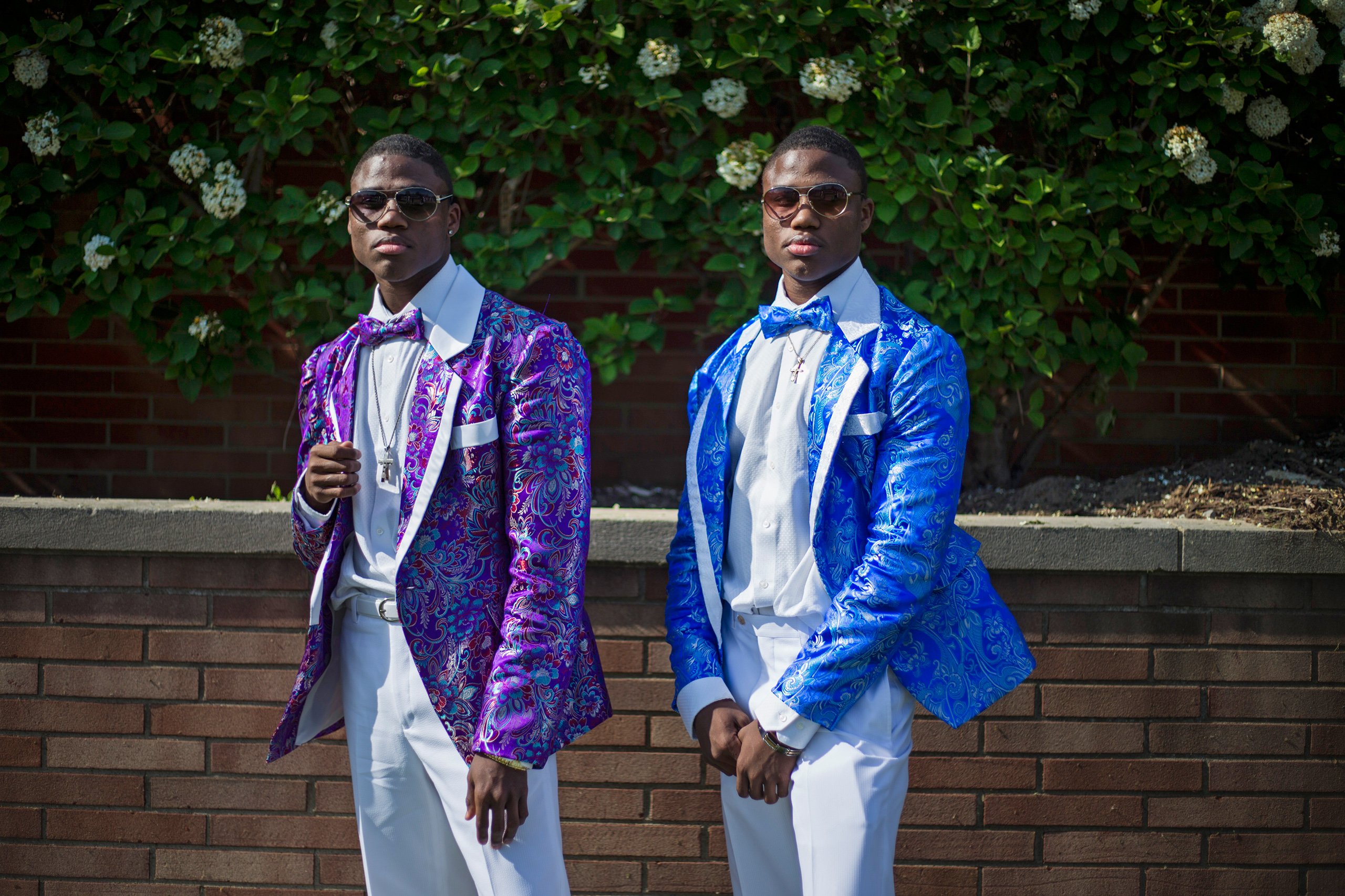 Antwoin and Antonio Nelson, both 18, of Flint, Mich., pose for a pre-prom picture outside Northwestern High School, May 21, 2016.From  Prom Season in Flint: How the City Celebrates in a Time of Crisis