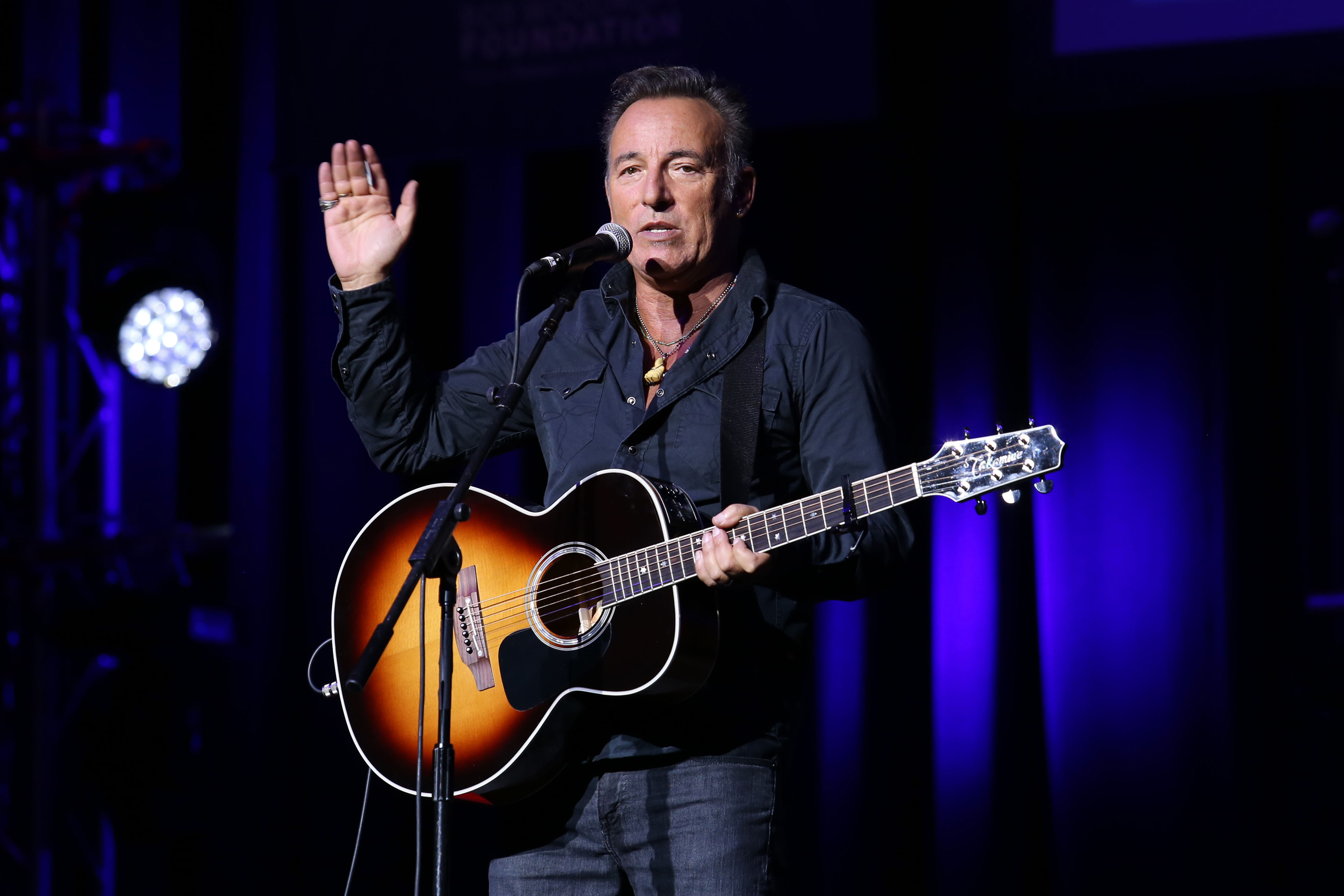 Bruce Springsteen performs at the 9th Annual Stand Up For Heroes event, presented by the New York Comedy Festival and The Bob Woodruff Foundation, at the Theater at Madison Square Garden on Tuesday, Nov. 10, 2015, in New York. (Photo by Greg Allen/Invision/AP)