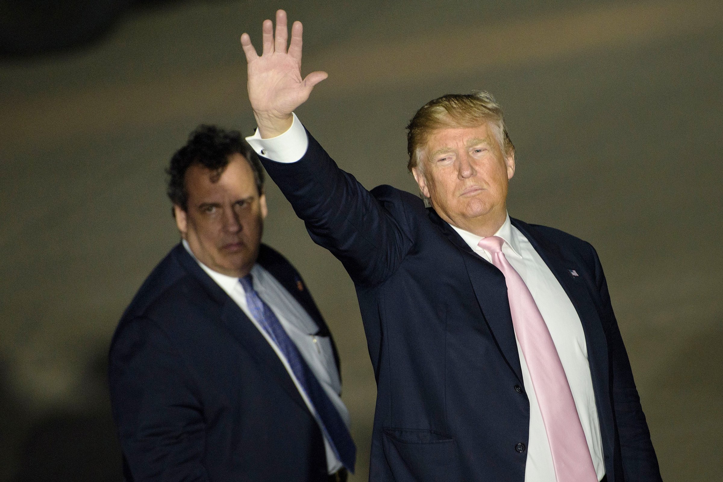 Chris Christie and Donald Trump depart a rally in Vienna Center, Ohio, on March 14, 2016.