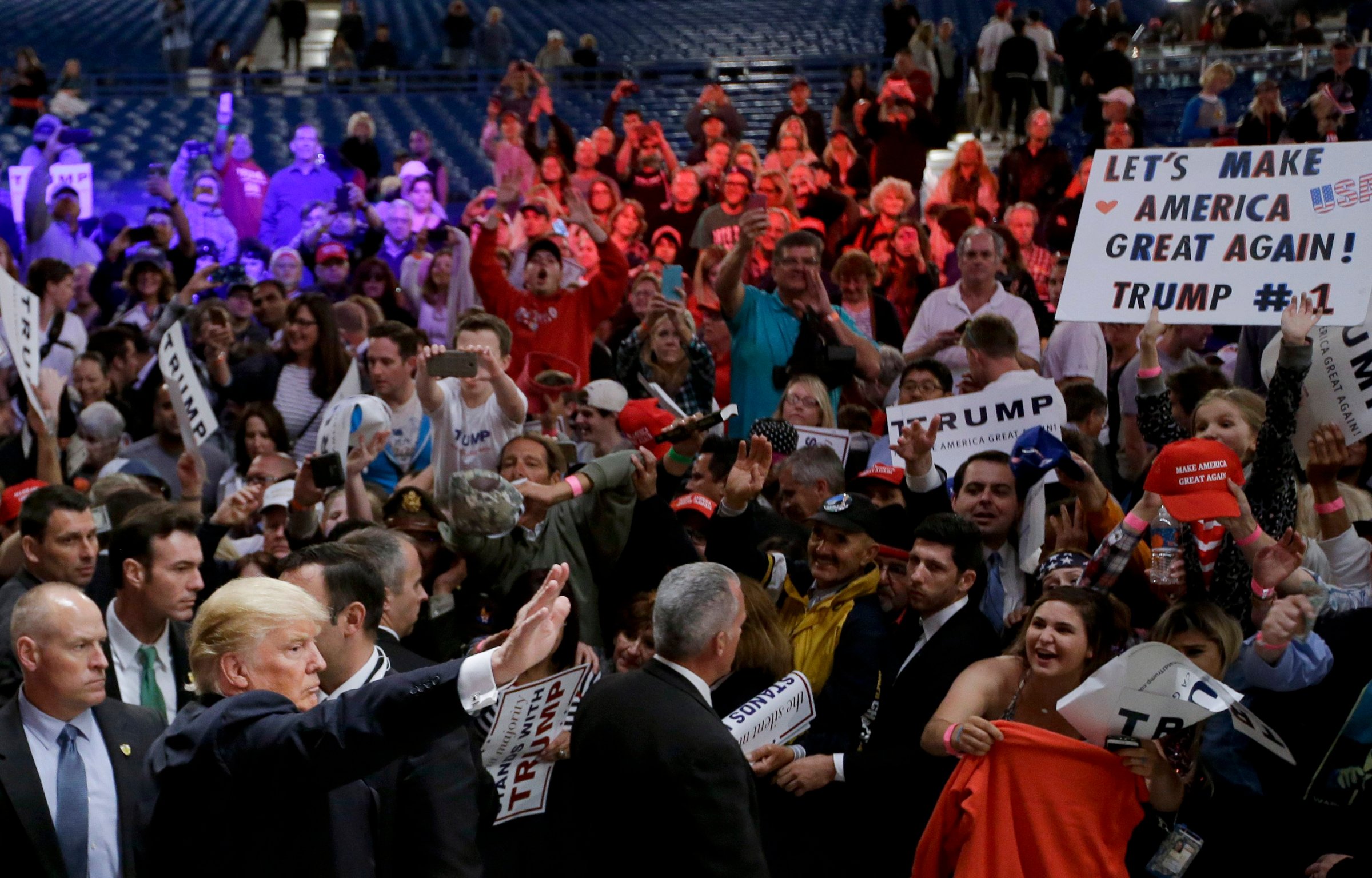 Republican presidential candidate Donald Trump greets supporters after a rally, Thursday, April 28, 2016 in Costa Mesa, Calif.