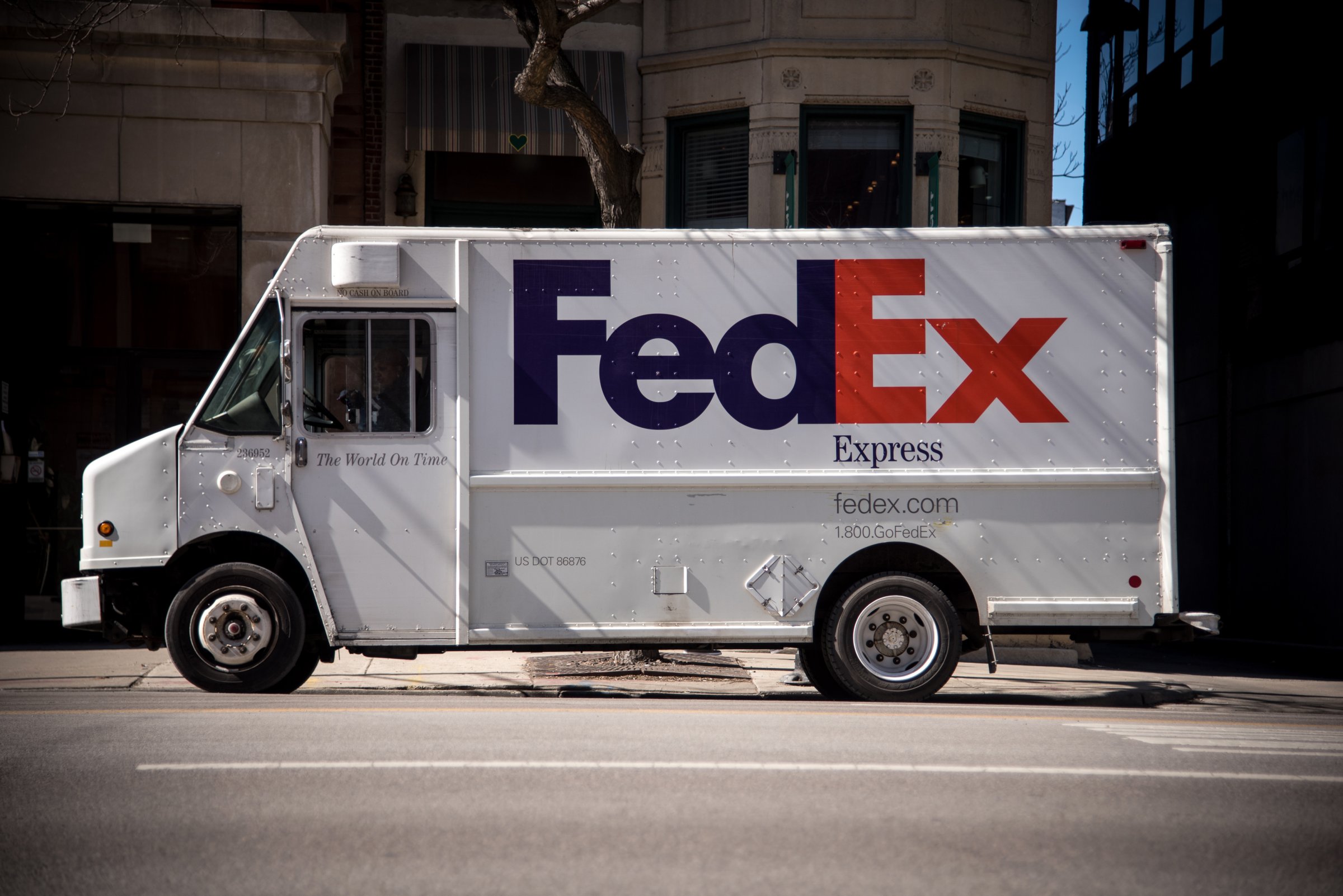 A FedEx Corp. delivery truck is parked on the street in Chicago, Illinois, U.S., on Friday, March 11, 2016.