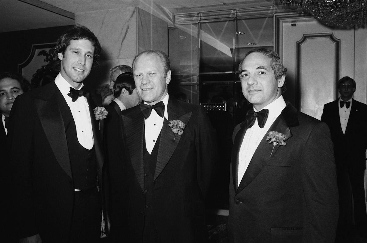 (l-r) Chevy Chase, Gerald Ford and White House Press Secretary Ron Nessen on March 25, 1976 (Fred Hermansky—NBC / Getty Images)
