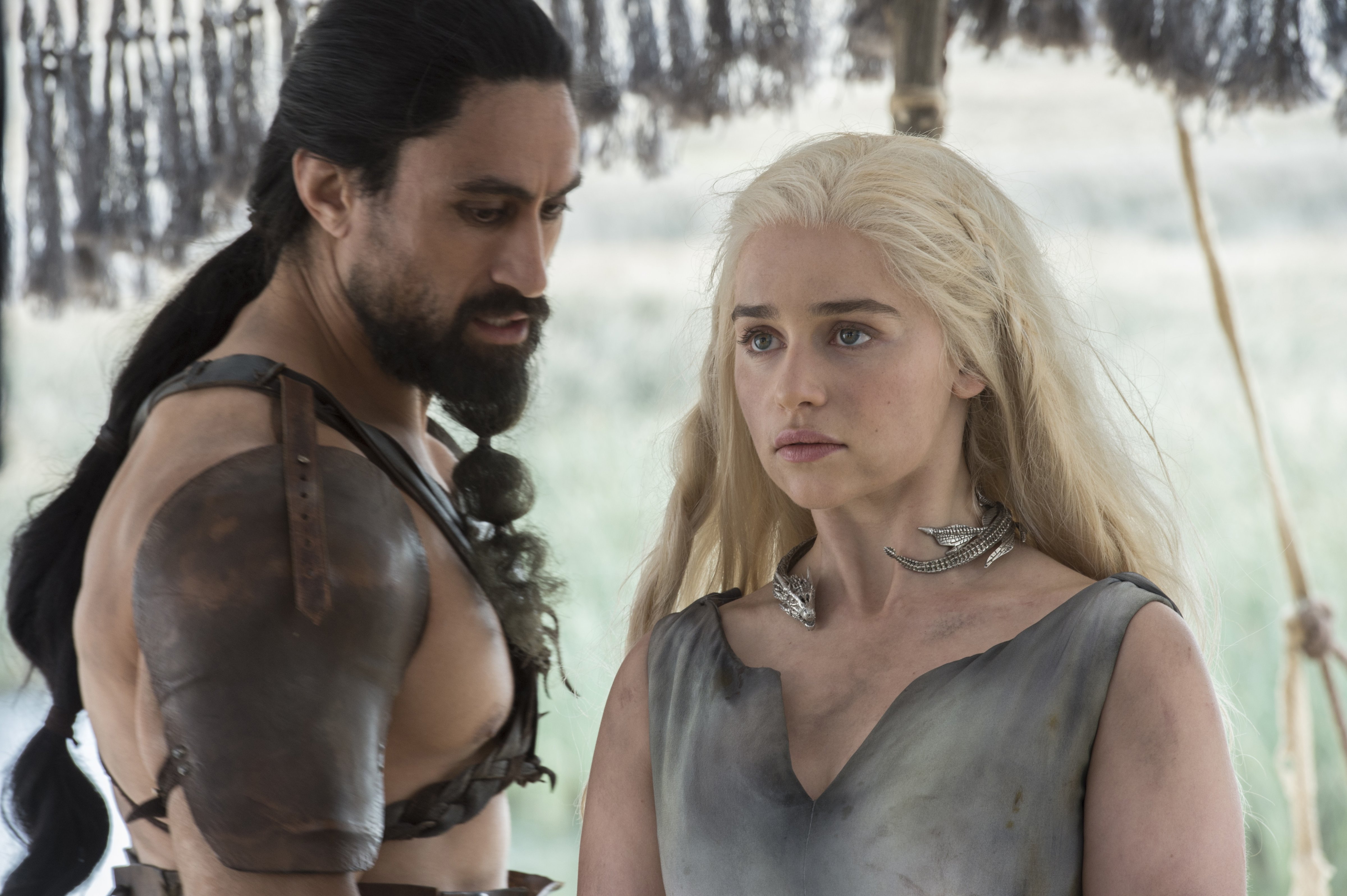 Joe Naufahu and Emilia Clarke in season 6, episode 1 in <i>Game of Thrones</i>. (Macall B. Polay—HBO)