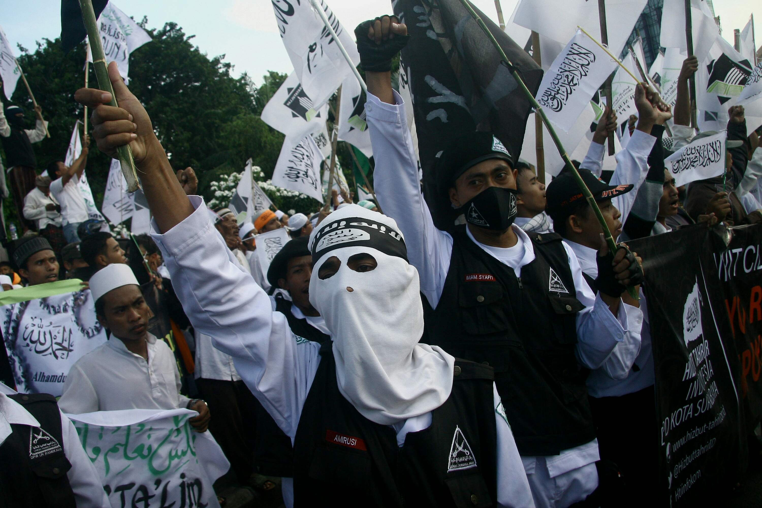 The Islamic Defenders Front holds a rally to support the closure of Southeast Asia's largest red-light area, Dolly, in the Indonesian city of Surabaya on June 18, 2014 (Anadolu Agency—Getty Images)