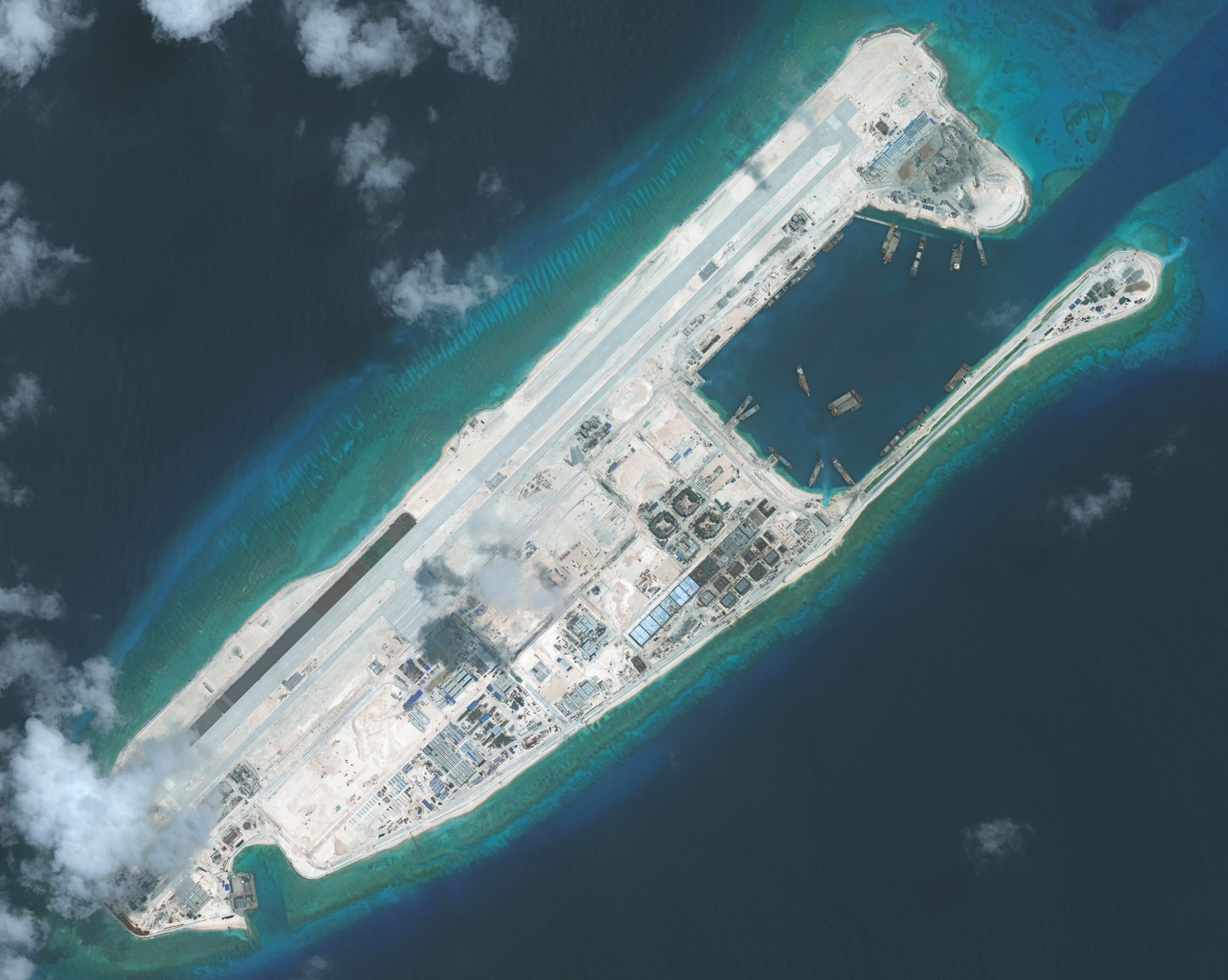 FIERY CROSS REEF, SOUTH CHINA SEA - SEPTEMBER 3, 2015:  DigitalGlobe imagery of the nearly completed construction within the Fiery Cross Reef located in the South China Sea. Fiery Cross is located in the western part of the Spratly Islands group.  Photo DigitalGlobe via Getty Images.