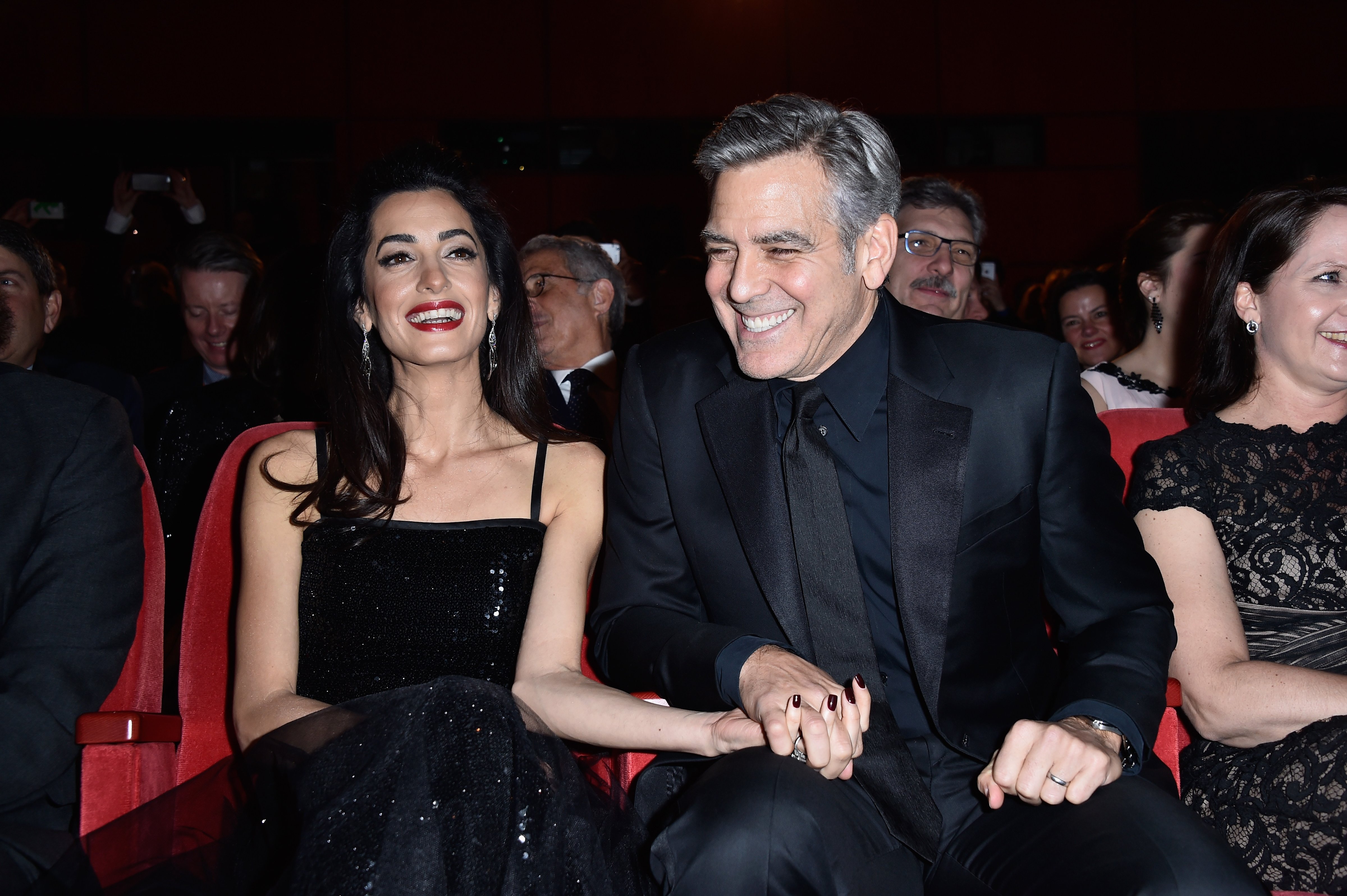 George Clooney and his wife Amal attend the premier of <i>Hail, Caesar!</i> during the Berlin International Film Festival on Feb. 11, 2016, in Berlin (Pascal Le Segretain—Getty Images)