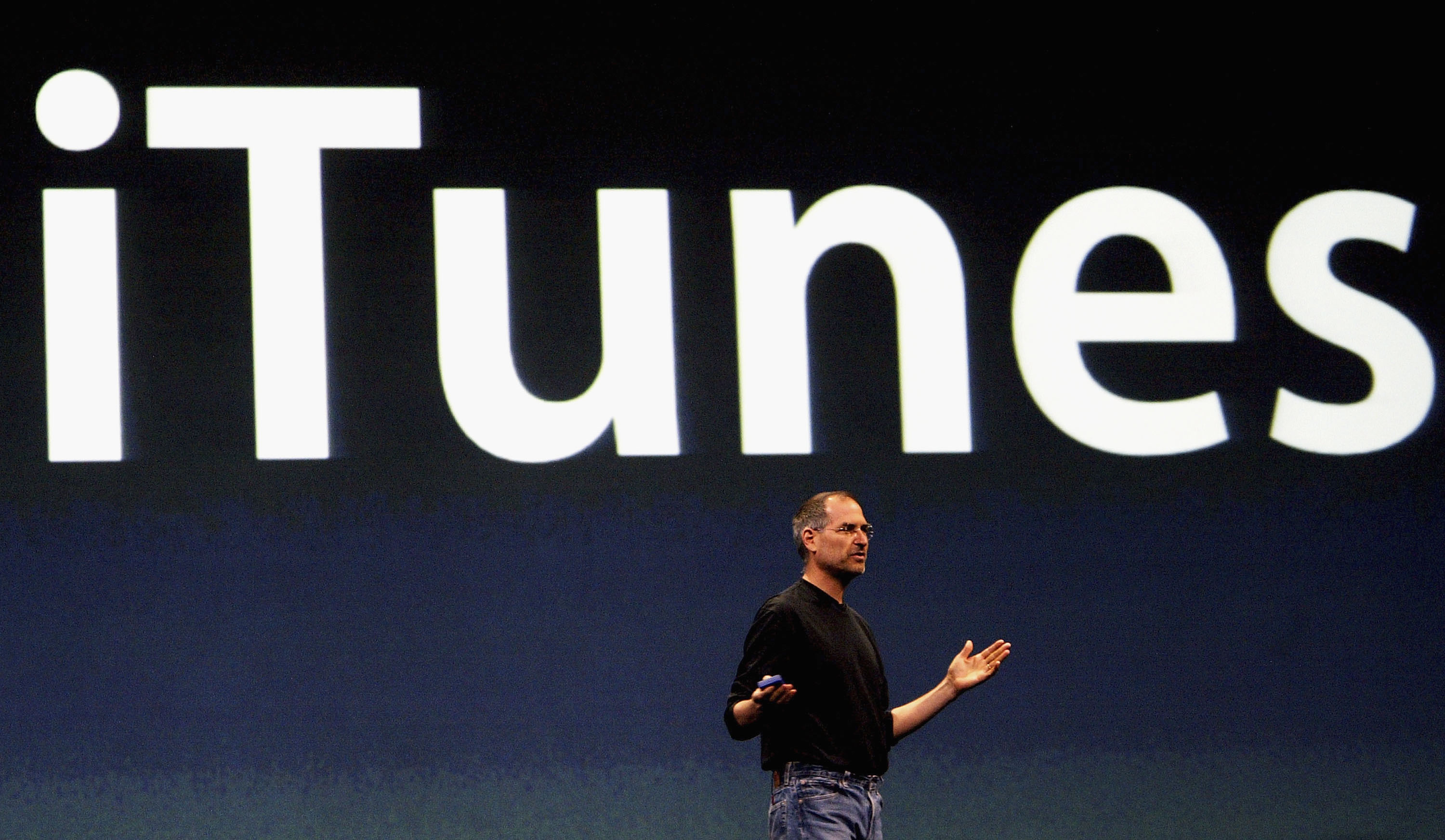 Steve Jobs, Chief Executive Officer of Apple computers, launches iTunes Music Store in the territories of Great Britain, Germany and France, on June 15, 2004 in London. (Ian Waldie&mdash;Getty Images)