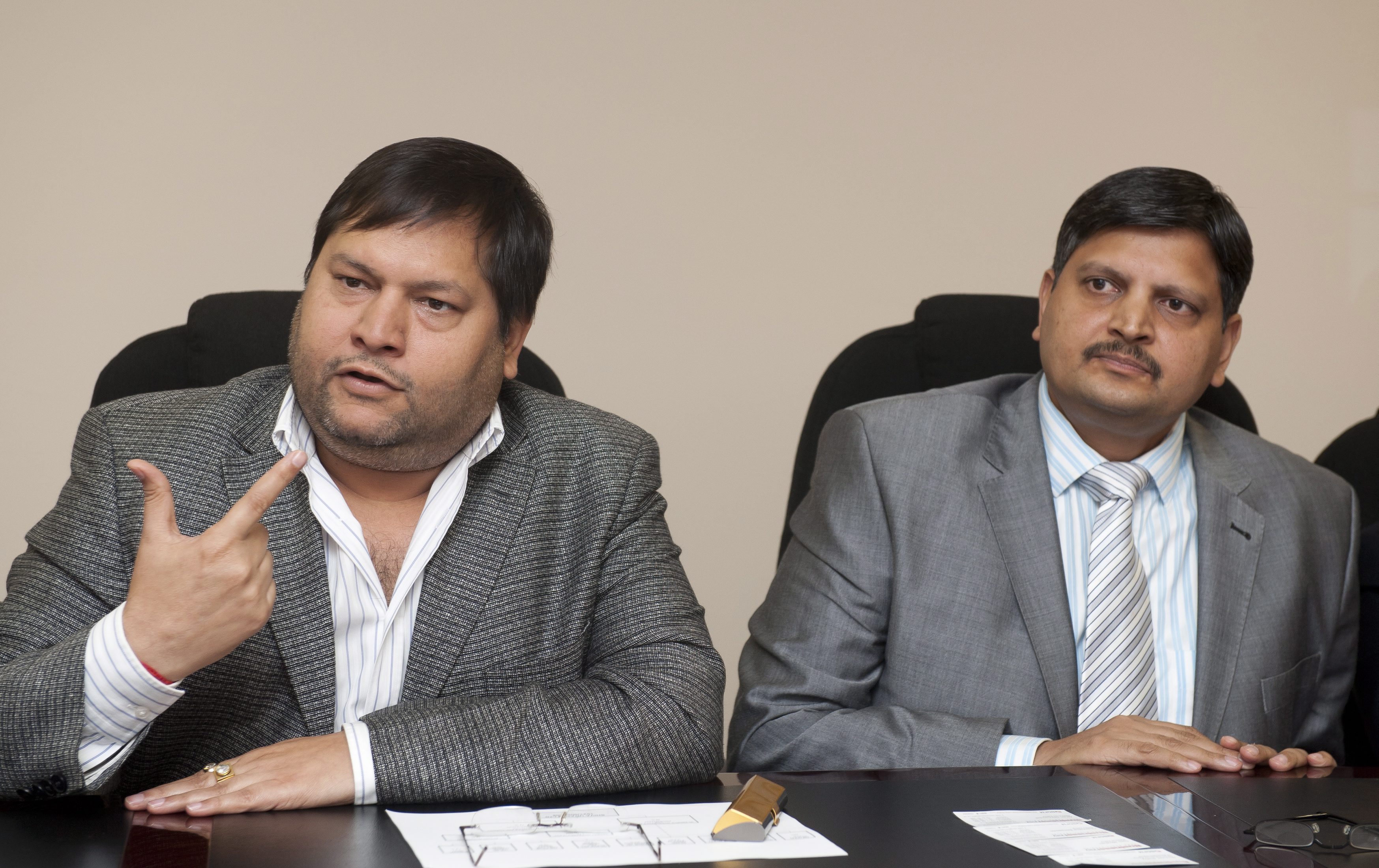 Indian businessmen Ajay Gupta, right, and younger brother Atul Gupta in Johannesburg on March 2, 2011 (Gallo Images/Getty Images)