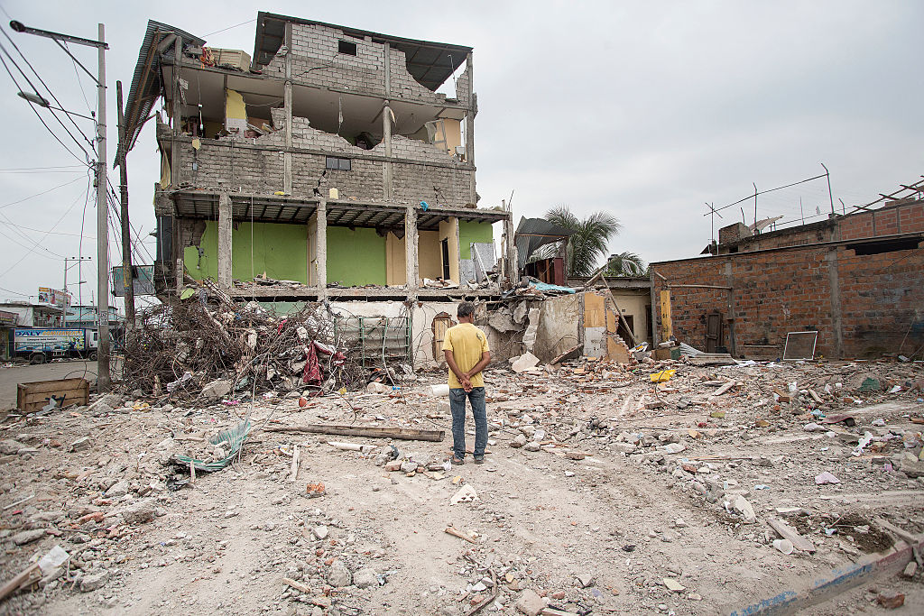 PEDERNALES, ECUADOR - APRIL 21:  A man observes the aftermaths of an earthquake struck Ecuador on April 21, 2016 in Pedernales, Ecuador. At least 400 people were killed after a 7.8-magnitude quake and the government's food supply is not reaching everyone. (Photo by Edu Leon/LatinContent/Getty Images) (Edu Leon/STR&mdash;LatinContent/Getty Images)