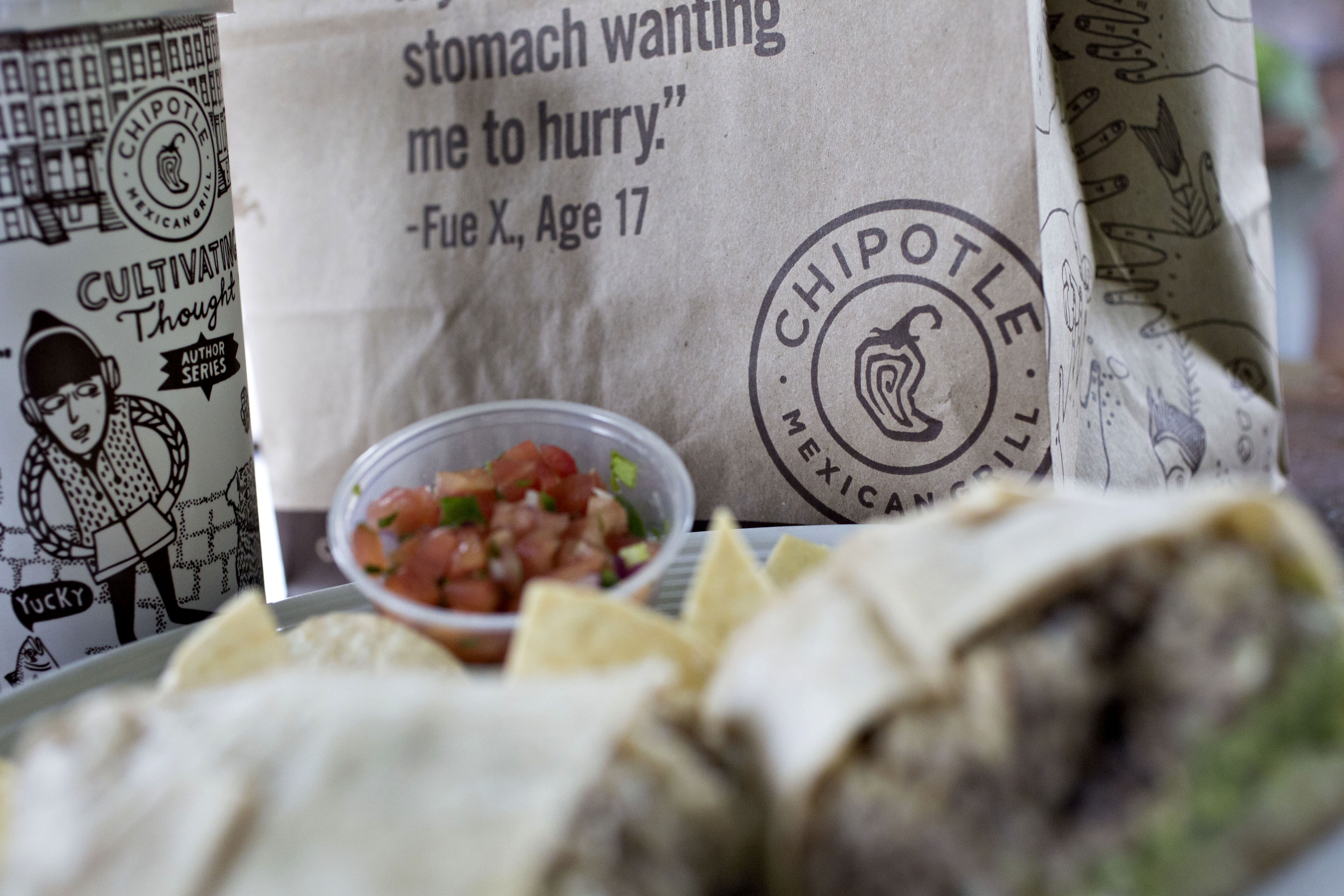 Chipotle Mexican Grill Inc. take-out food is arranged for a photograph in Tiskilwa, Illinois, U.S., on Friday, April 22, 2016. Chipotle Mexican Grill Inc. is expected to release earnings figures on April 26. Bloomberg&mdash;Bloomberg via Getty Images (Bloomberg&mdash;Bloomberg via Getty Images)