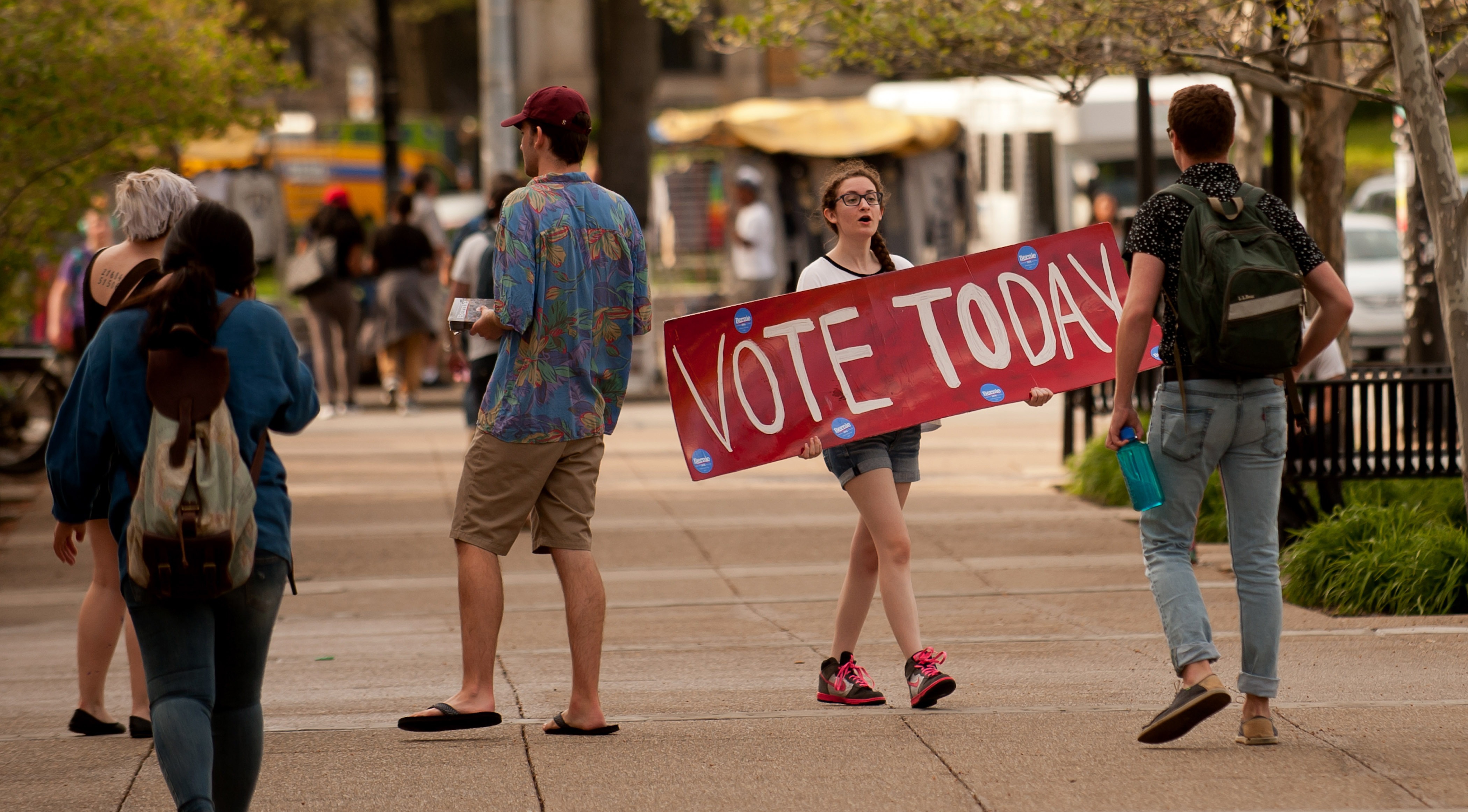 Bernie Sanders supporter Maria DelGrande implores passersby to vote in the Pennsylvania primary election on April 26, 2016 in Pittsburgh, Pennsylvania. (Jeff Swensen—Getty Images)