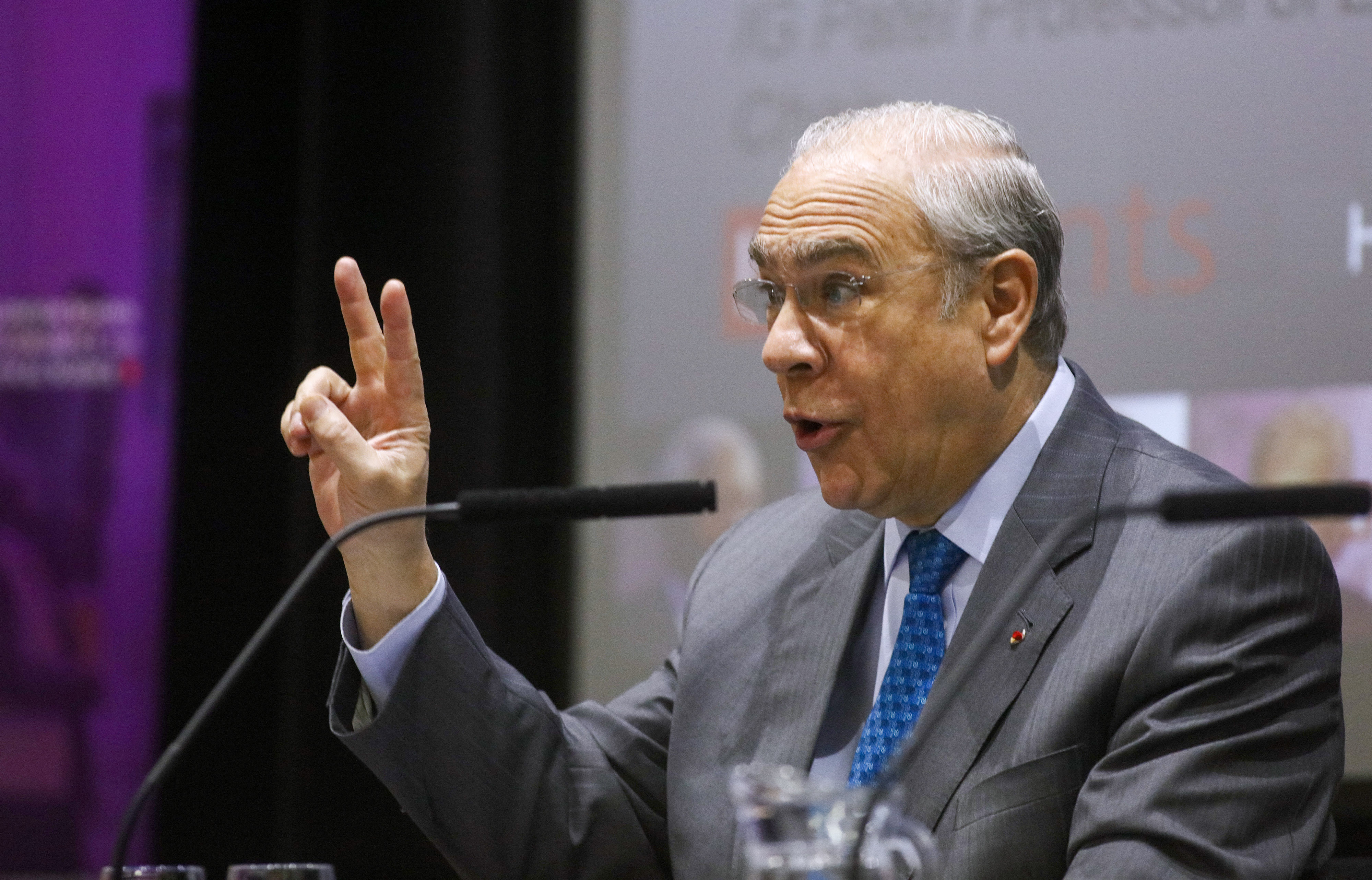 Jose Angel Gurria, secretary-general of the Organization for Economic Cooperation and Development (OECD), gestures while waiting to make a speech at the London School of Economics (LSE) in London, U.K., on Wednesday, April 27, 2016. The Organization for Economic Cooperation and Development became the latest international body to warn the U.K. that leaving the European Union would cause lasting damage to the economy, earning rebukes from campaigners for a so-called Brexit. (Bloomberg—Bloomberg via Getty Images)