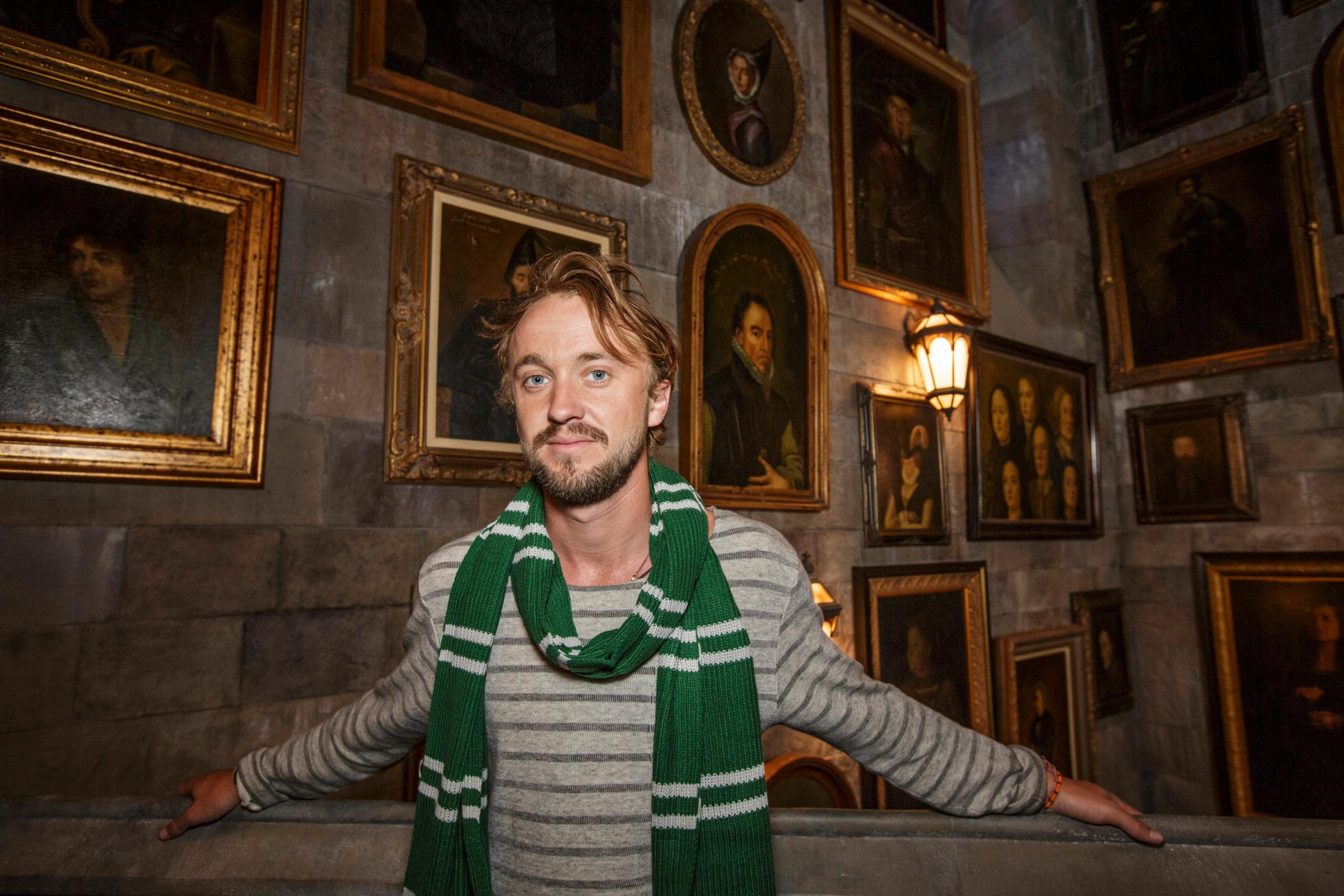 Tom Felton, who played Draco Malfoy, inside the Portrait Gallery in Hogwarts Castle.