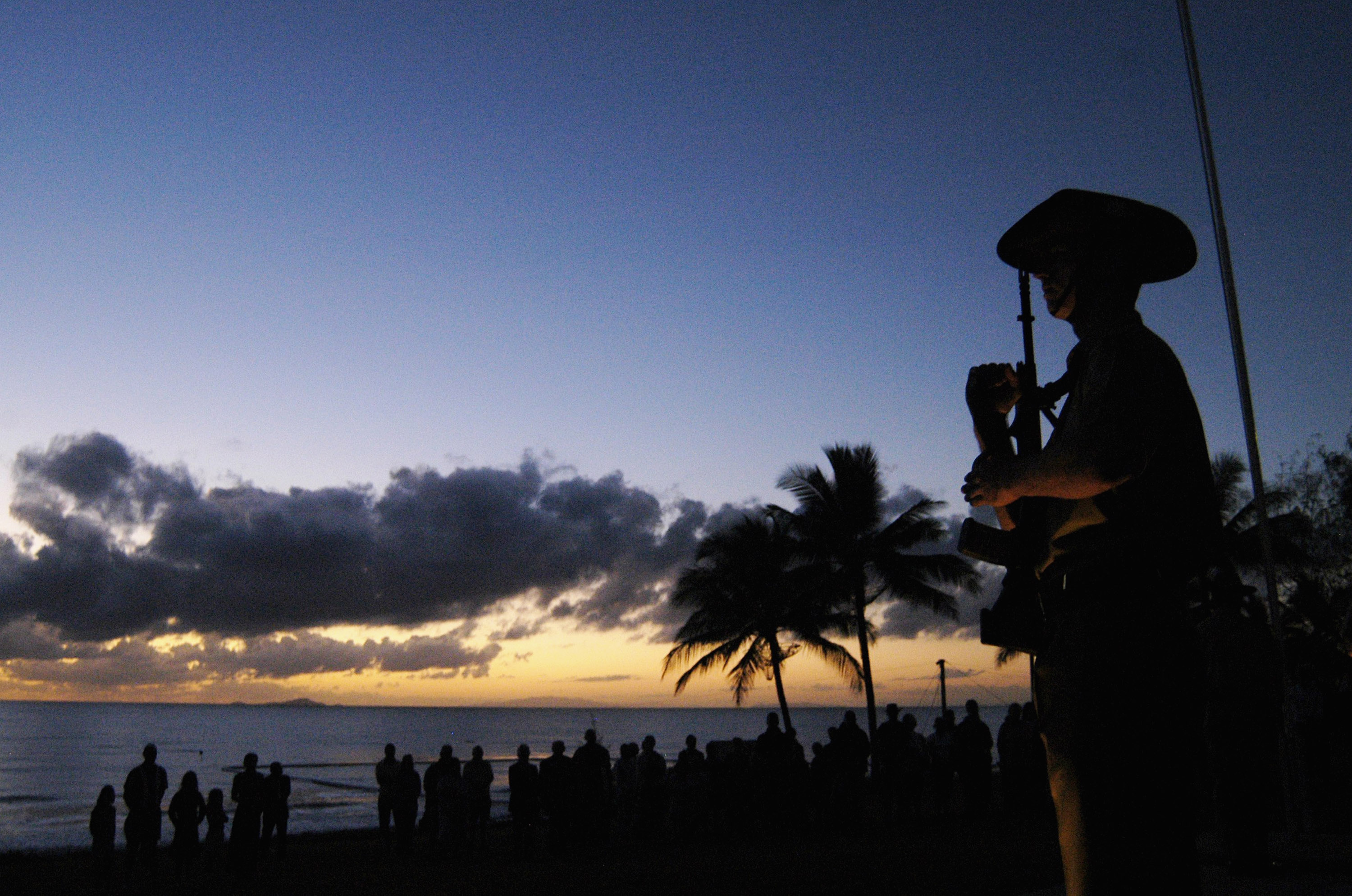 A dawn commemorative  service at Balgal Beach  in Australia on Anzac Day in 2007. (Ian Hitchcock—Getty Images)