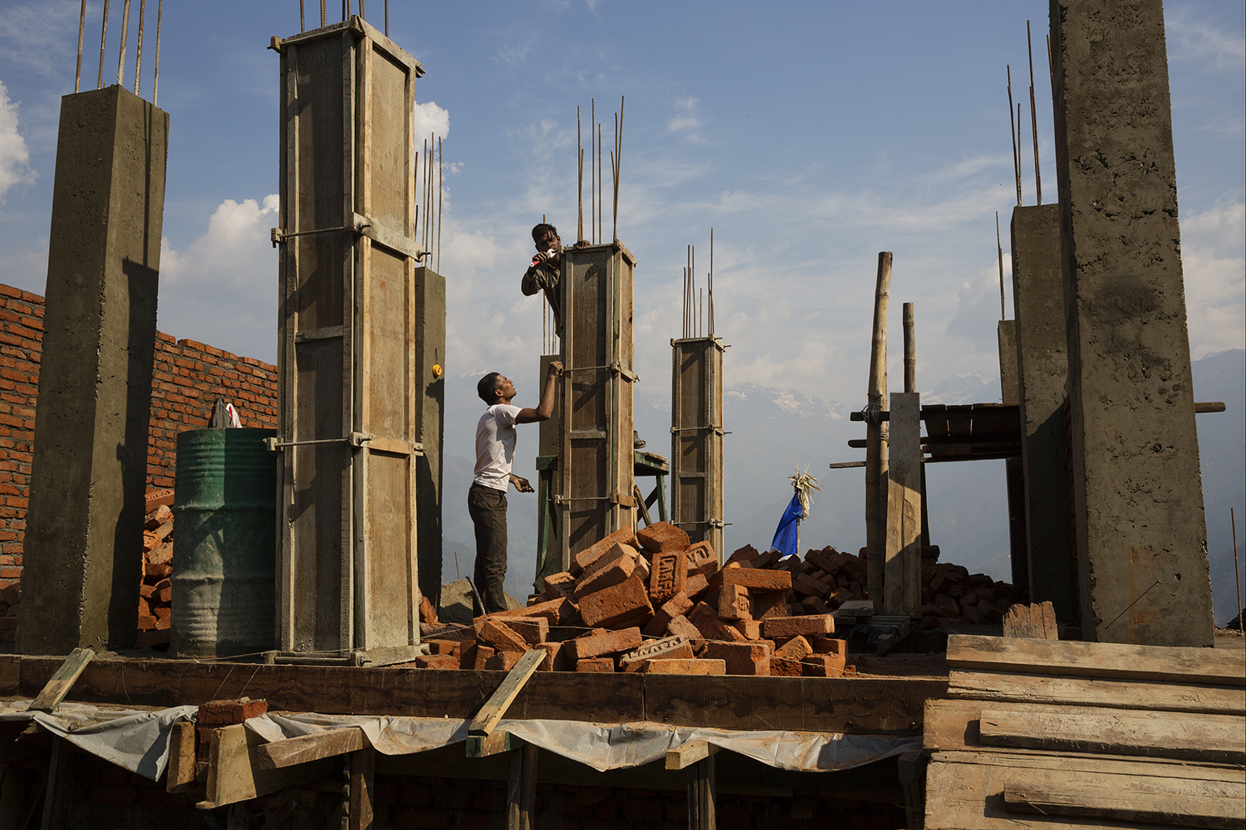 Villagers rebuilding houses on April 7, 2016, in Barpak, in Gorkha district, Nepal, at the epicenter of the 2015 earthquakes, which were the worst natural disaster to befall Nepal in more than eight decades (James Nachtwey for TIME)