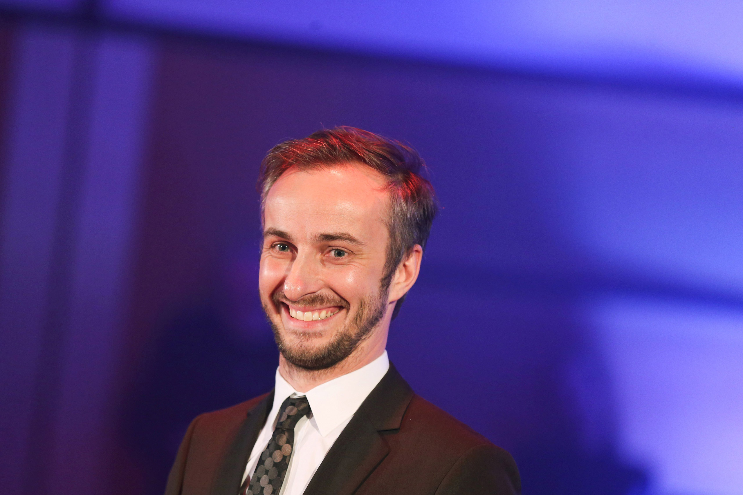 Picture taken on January 13, 2016 shows German TV comedian Jan Boehmermann during an award ceremony in Duesseldorf, western Germany. Chancellor Angela Merkel on April 15, 2016 authorised a Turkish demand for criminal proceedings against Boehmermann over a crude satirical poem about President Recep Tayyip Erdogan in a bitter row over free speech. / AFP / dpa / Rolf Vennenbernd / Germany OUT        (Photo credit should read ROLF VENNENBERND/AFP/Getty Images)