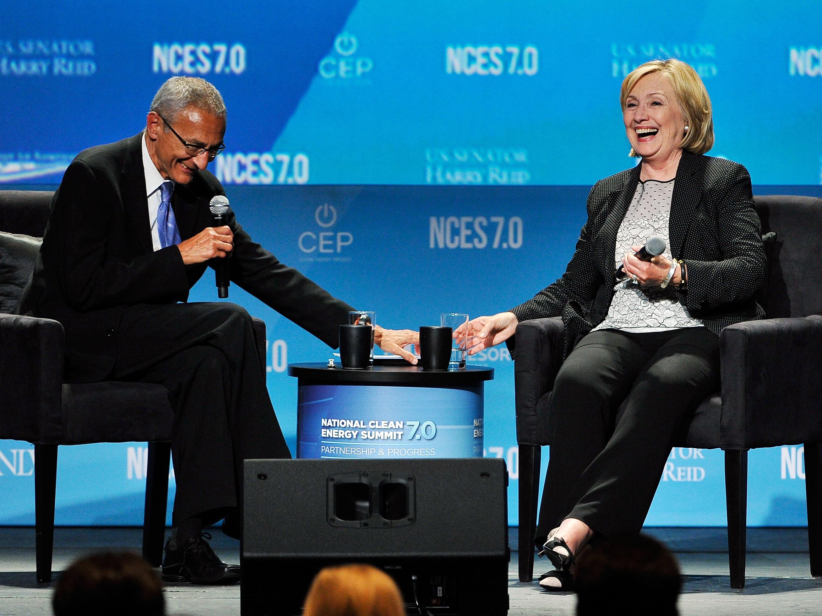 John Podesta, left, and Hillary Clinton attend the National Clean Energy Summit 7.0 on Sept. 4, 2014 in Las Vegas. (David Becker—Getty Images for National Clean)