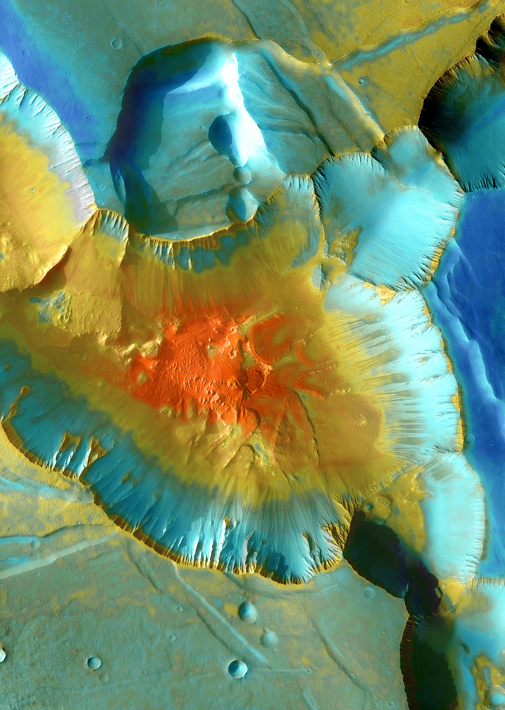 A false-color mosaic focuses on one junction in Noctis Labyrinthus where Mars canyons meet to form a depression 13,000 feet deep. Dust lies on the upper surfaces, while rockier material lies below. The pictures used to create this mosaic image were taken by the Thermal Emission Imaging System instrument on NASA's Mars Odyssey orbiter and acquired from April 2003-Sept. 2005.