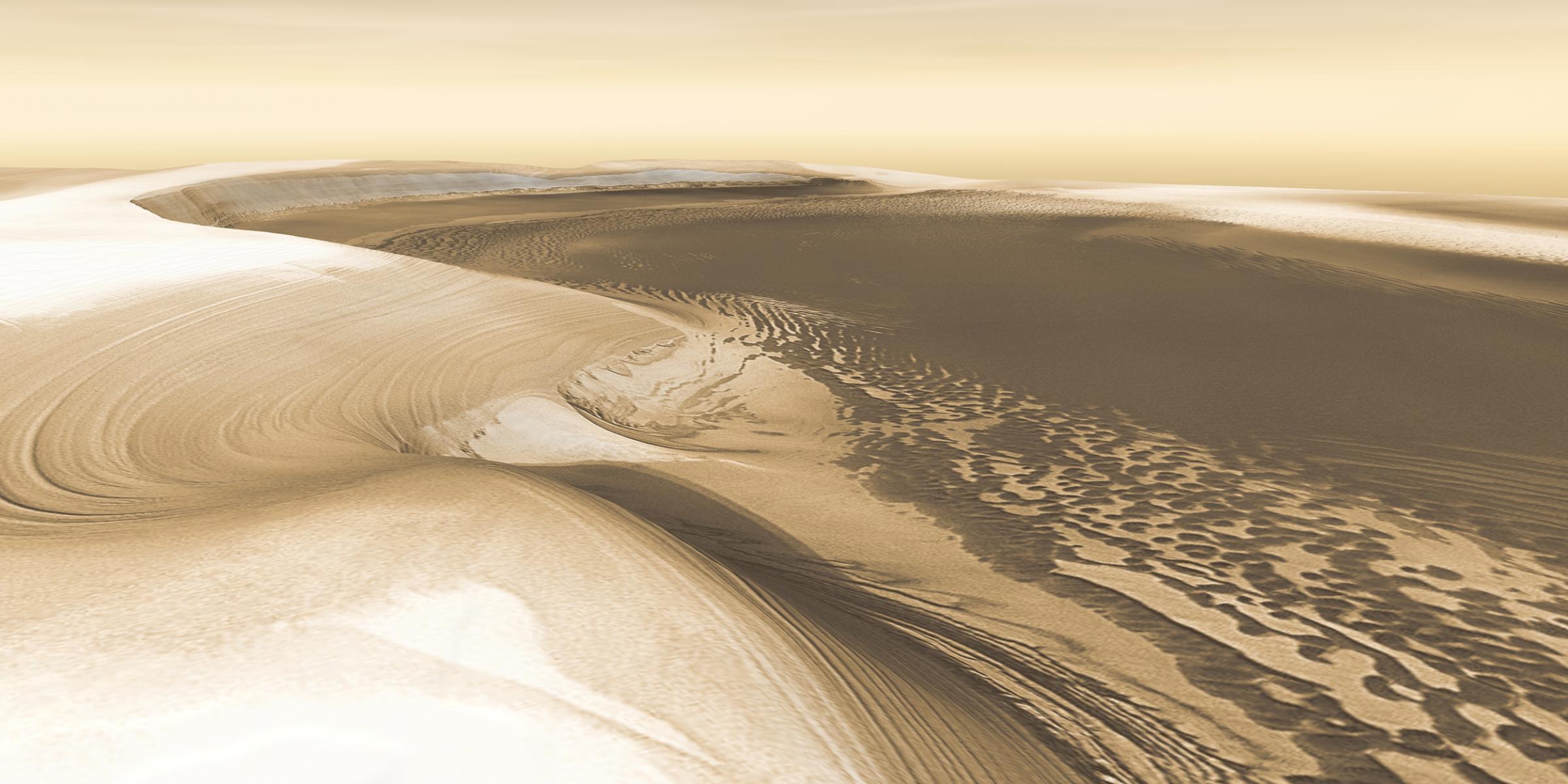 Chasma Boreale: A long, flat-floored valley that cuts deep into Mars' north polar icecap. Its walls rise about 4,600 feet above the floor. Where the edge of the ice cap has retreated, sheets of sand are emerging that accumulated during earlier ice-free climatic cycles. Winds blowing off the ice have pushed loose sand into dunes and driven them down-canyon in a westward direction, toward our viewpoint. This scene combines images taken during the period from Dec. 2002 to Feb. 2005 by the Thermal Emission Imaging System instrument on NASA's Mars Odyssey orbiter.