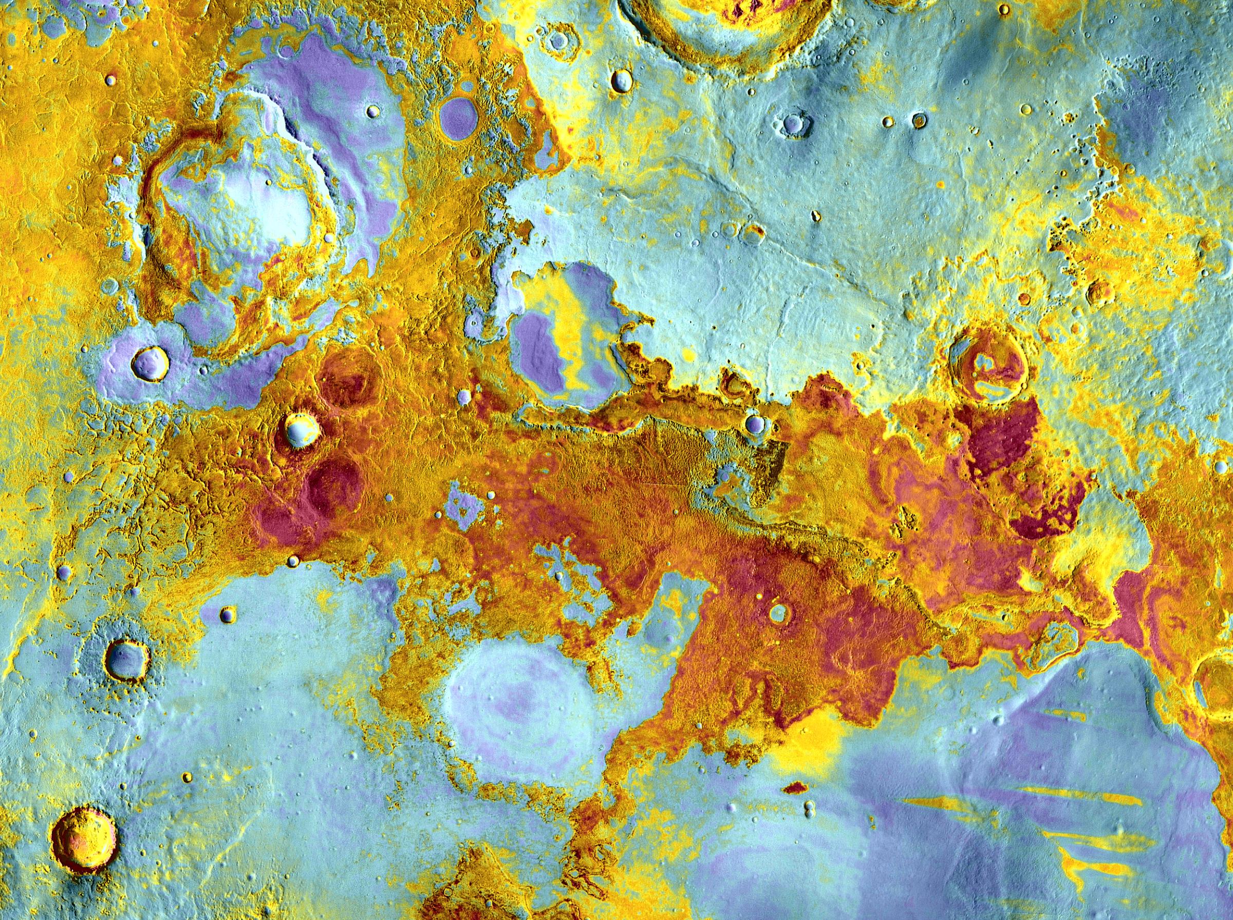 This image here shows a false-color view of part of Meridiani Planum, about 250 miles northeast of where Opportunity landed. The image was taken by the Thermal Emission Imaging System on NASA's Mars Odyssey orbiter and acquired Dec. 2004.