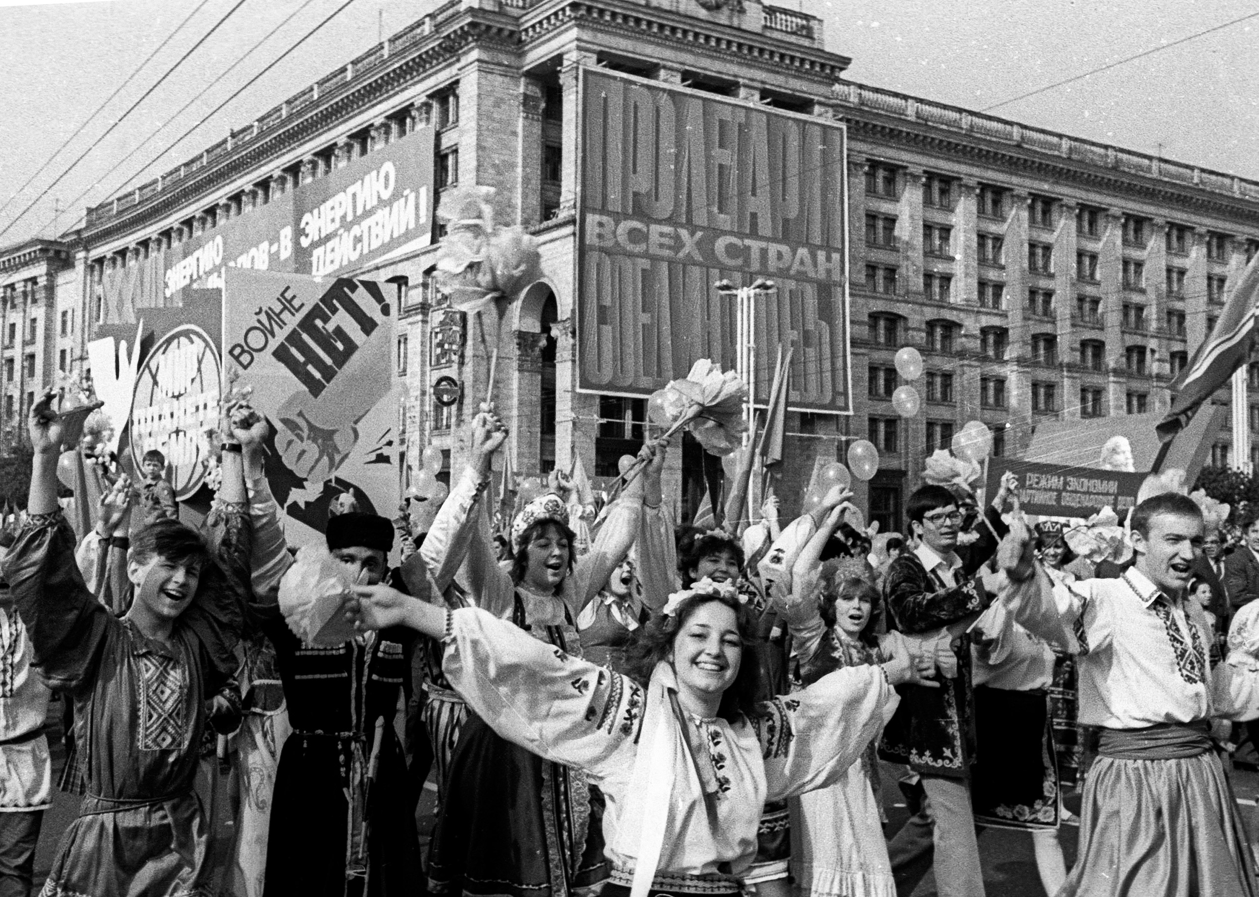 A few days after the deadly explosion on the 4th unit in Chernobyl nuclear power plant, people rallied to celebrate the International Workers' Day in Kiev, Ukraine, on May 1, 1986. Nobody cancelled the May Day parade in Kiev when thousands of people walked in columns along the streets, with songs, flowers and Soviet leaders portraits, covered with invisible clouds of fatal radiation. (AP)
