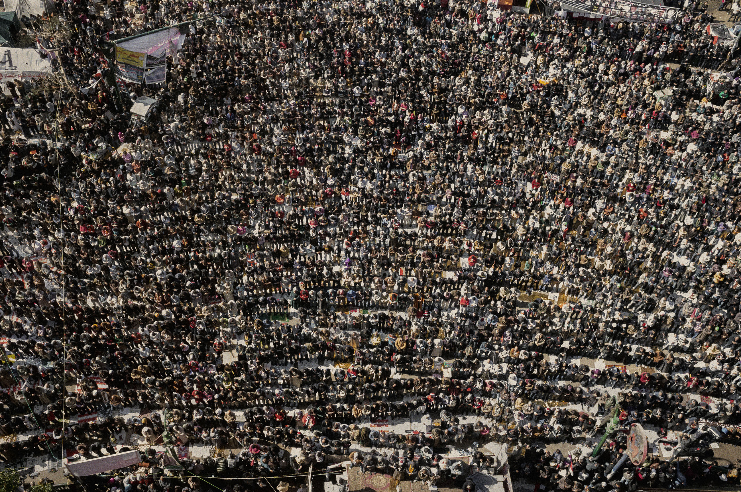 Mass outdoor prayer during
                              the first anniversary of the
                              Revolution in Tahrir Square, Cairo, Egypt, Jan. 2012.