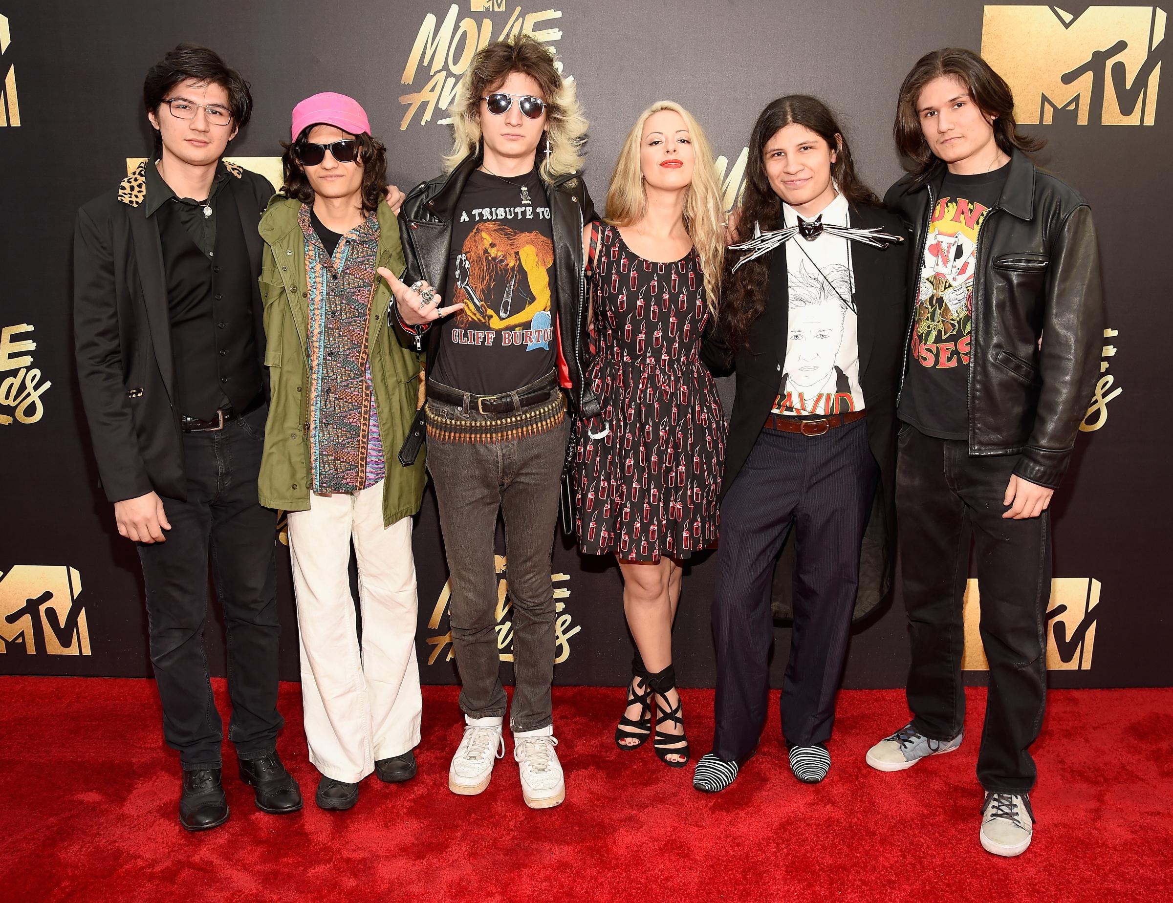 Director Crystal Moselle and "The Wolfpack" Angulo Brothers attend the 2016 MTV Movie Awards at Warner Bros. Studios on April 9, 2016 in Burbank, Calif.
