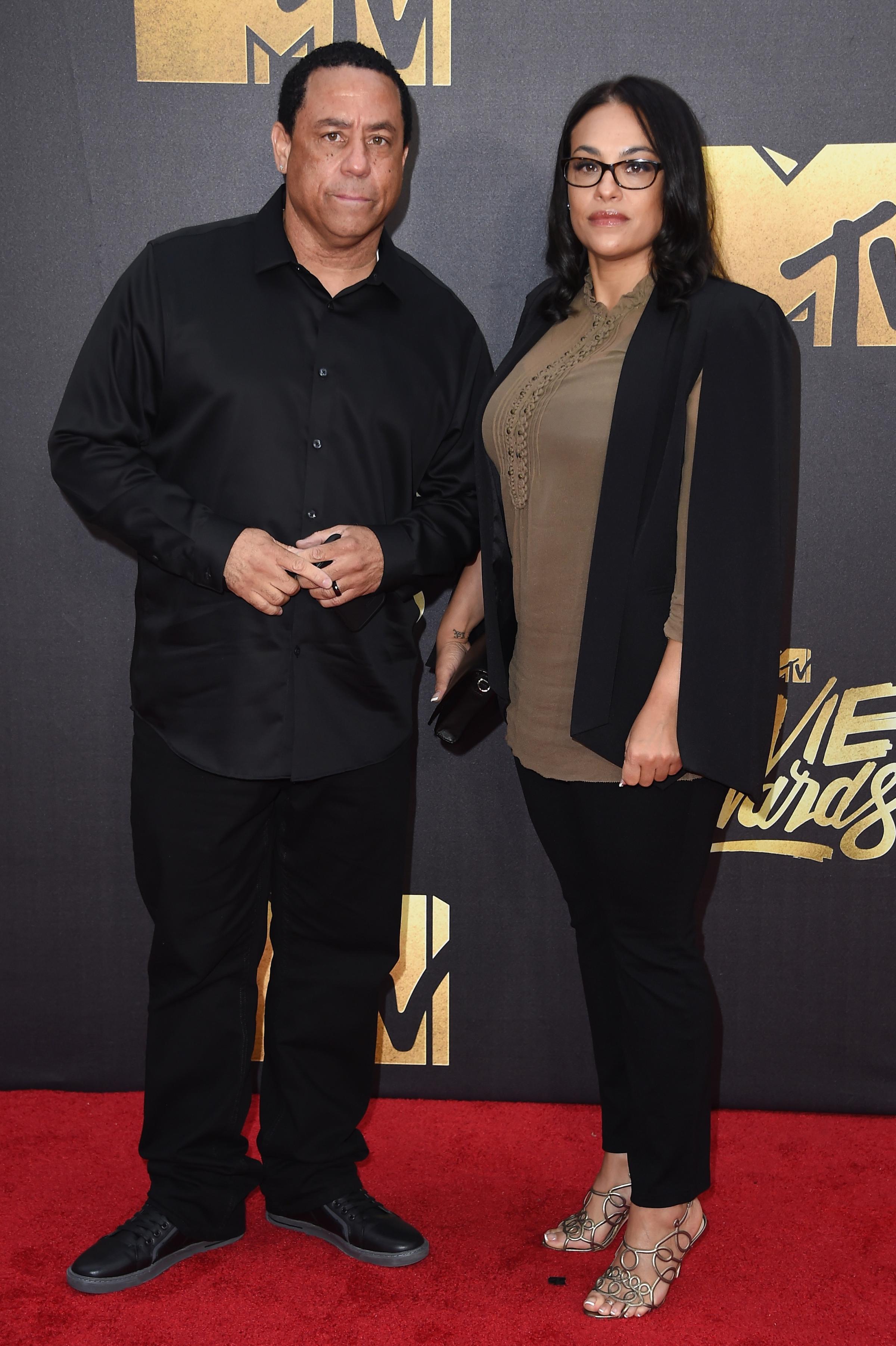 DJ Yella of N.W.A and producer Tomica Woods-Wright attend the 2016 MTV Movie Awards at Warner Bros. Studios on April 9, 2016 in Burbank, Calif.