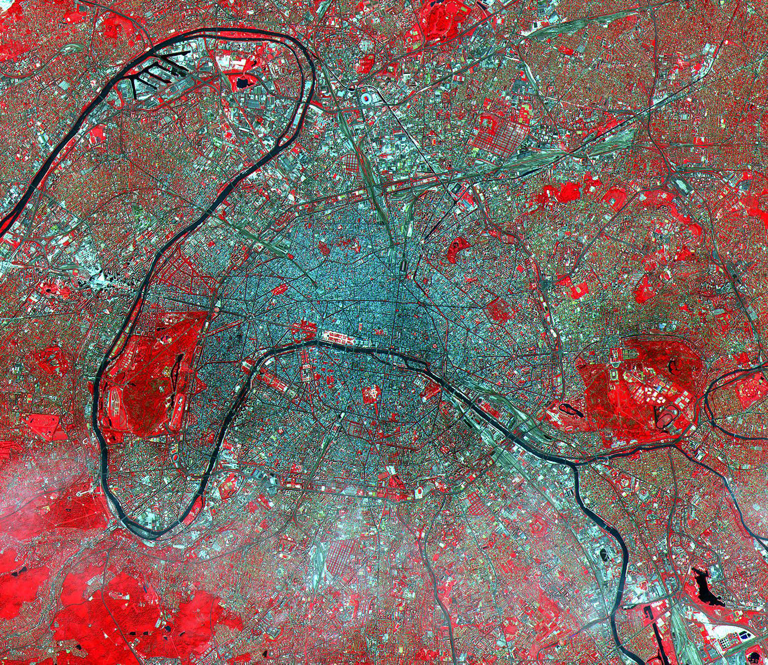 This image of Paris captures data from visible to thermal infrared wavelengths, which displays vegetation in red. It was acquired on July 23, 2000.