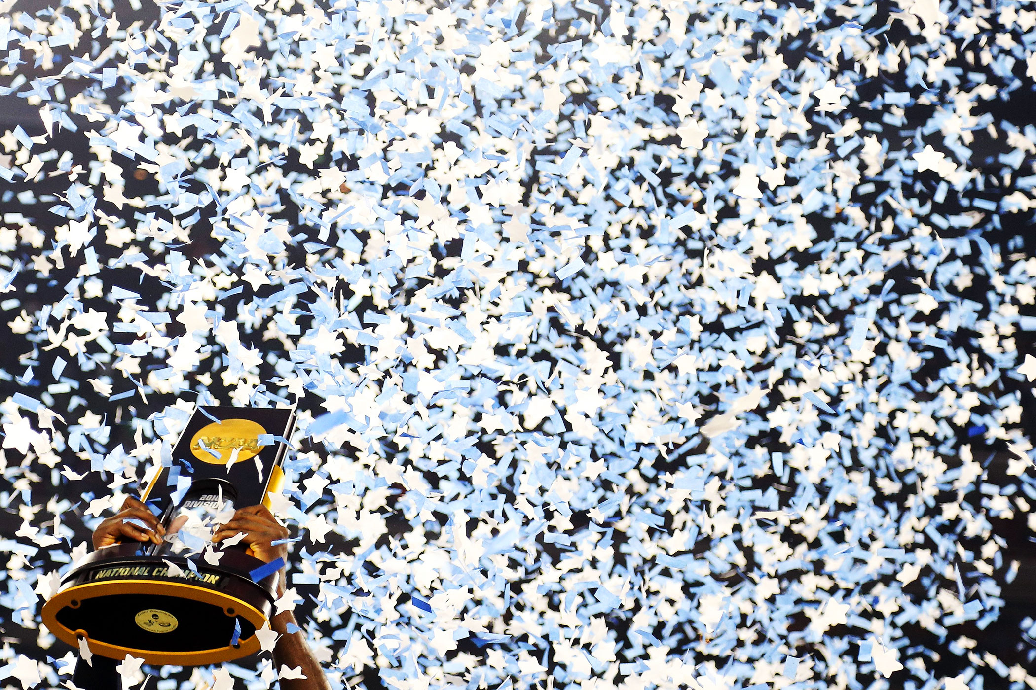 The Villanova Wildcats hoist the trophy after defeating the North Carolina Tar Heels 77-74 to win the NCAA college basketball National Championship game on April 4, 2016 in Houston.