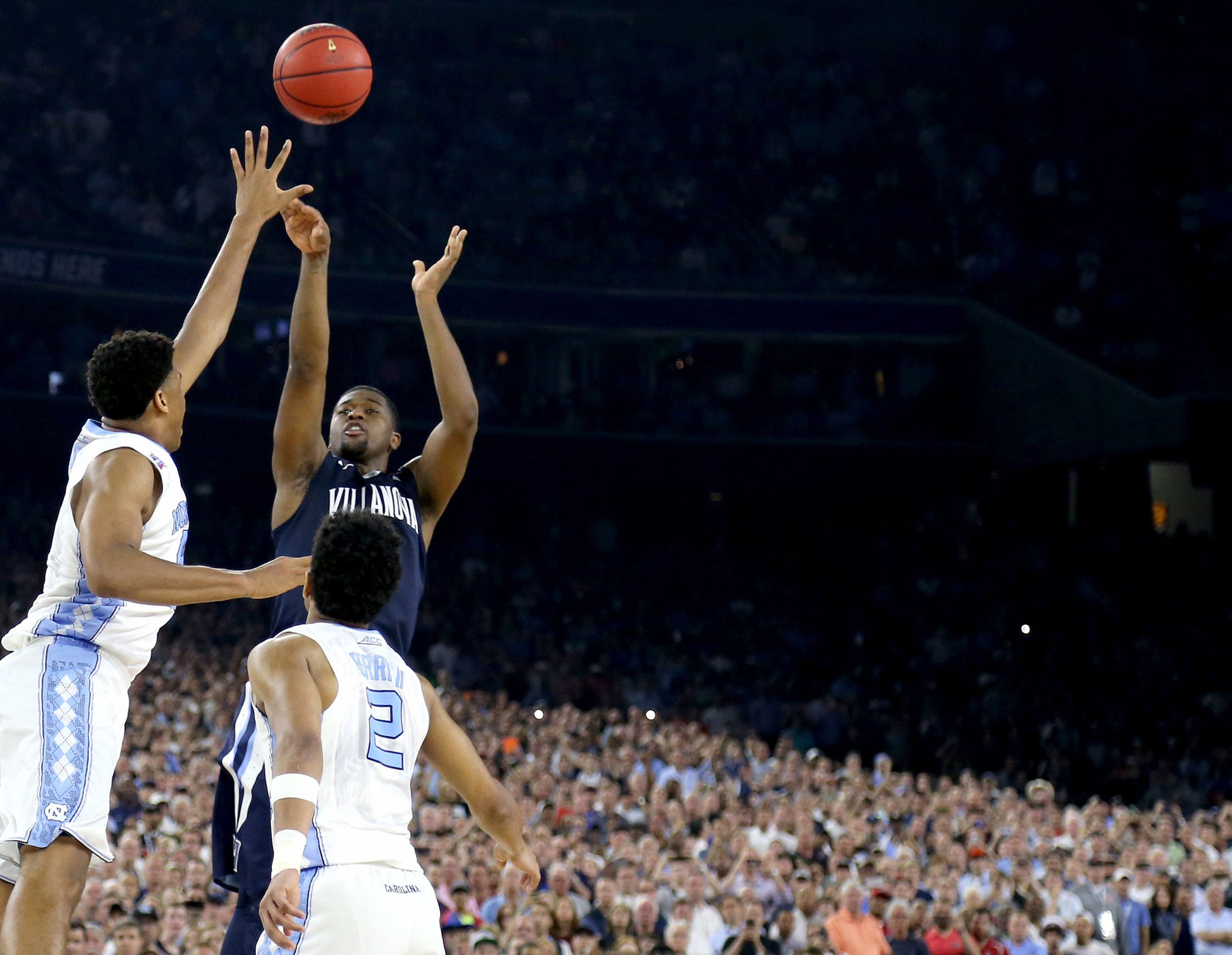 Villanova Wildcats' Kris Jenkins (2) shoots the game-winning three pointer to defeat the North Carolina Tar Heels 77-74 in the NCAA college basketball National Championship game on April 4, 2016 in Houston.
