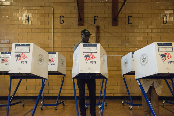 A man votes at Public School 22 on April 19, 2016 in the Brooklyn borough of New York City.