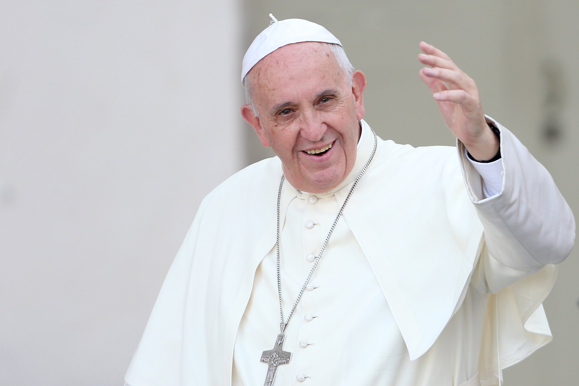 Pope Francis waves to the faithful as he arrives in St. Peter's Square for a meeting with the Roman Diocesans on June 14, 2015 in Vatican City, Vatican.