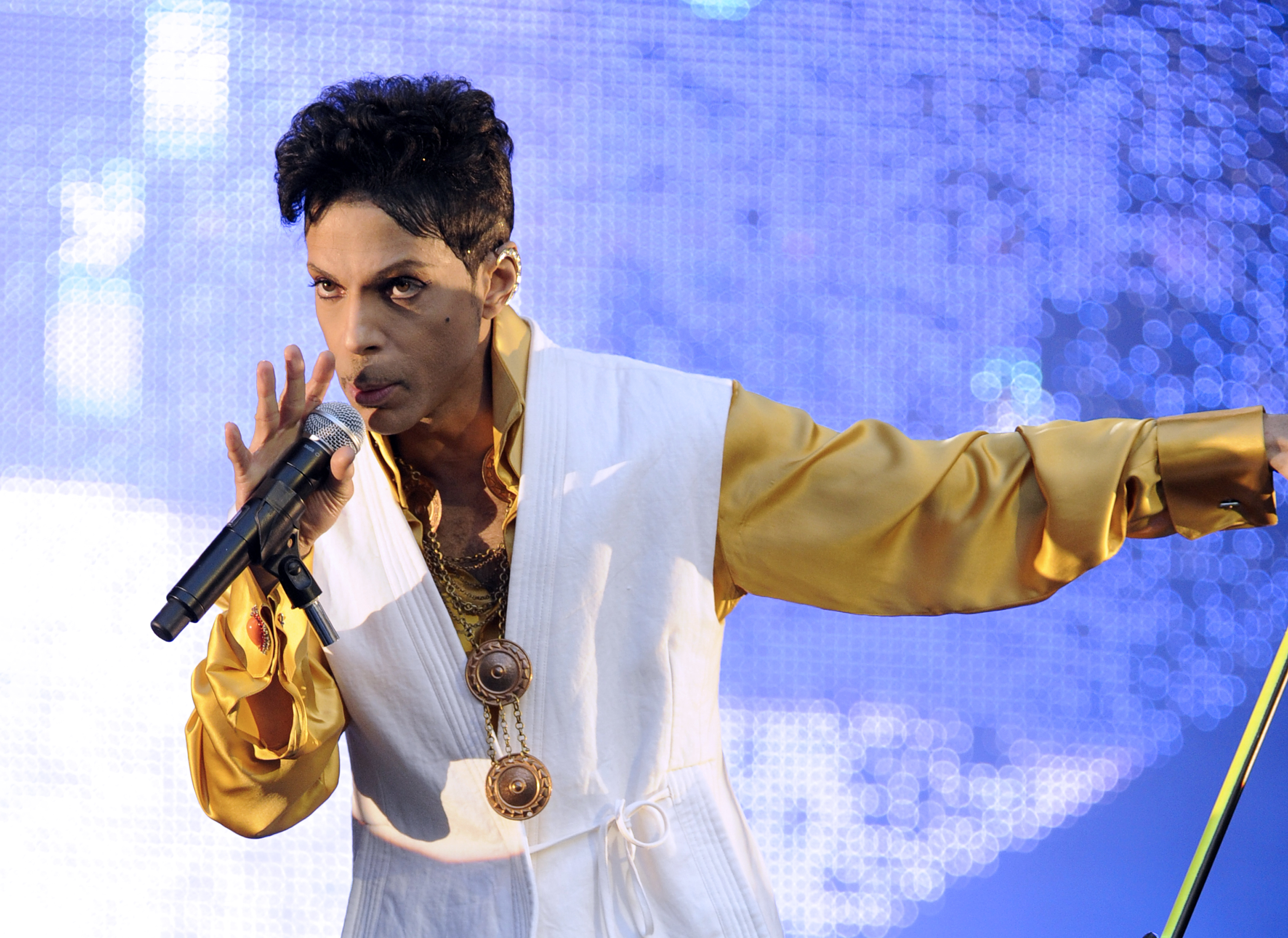 US singer and musician Prince (born Prince Rogers Nelson) performs on stage at the Stade de France in Saint-Denis, outside Paris, on June 30, 2011. (Betrand Guay—AFP/Getty Images)