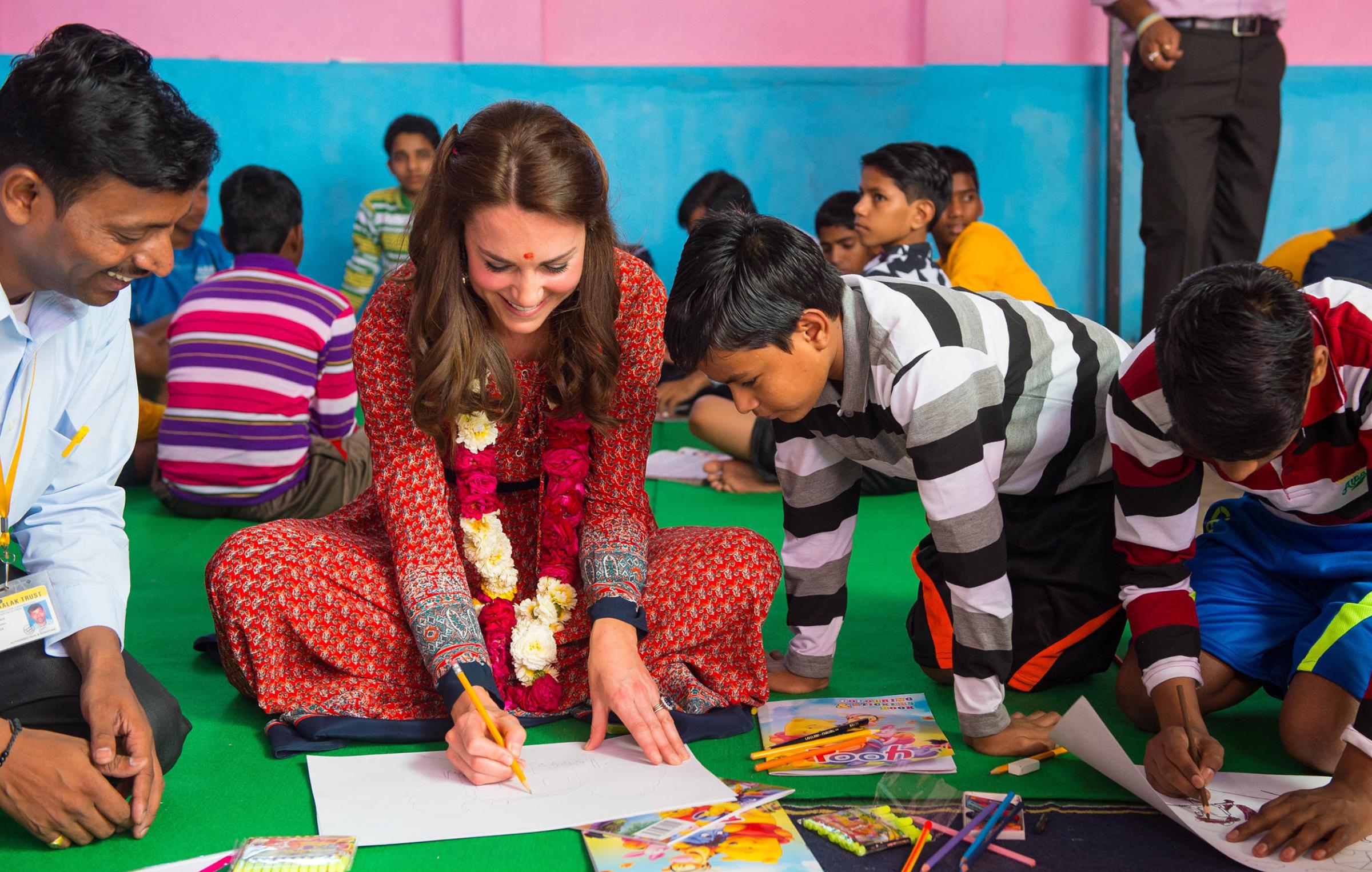 Catherine, Duchess of Cambridge participates in an arts class with street children at a contact centre run by the charity Salaam Baalak, which provides emergency help and long term support to homeless children at New Delhi railway station in New Dehli, India on April 12, 2016.