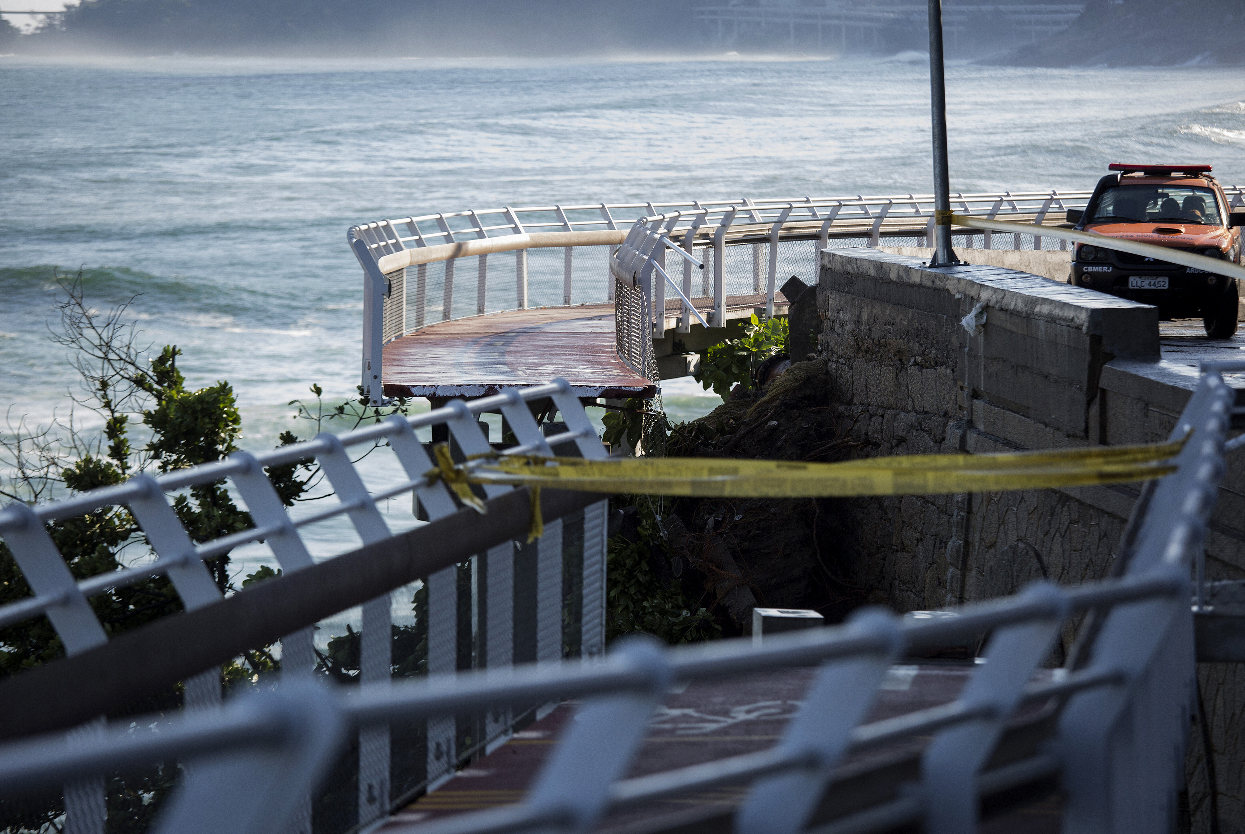 Damage is seen at the site of a collapsed section of a bicycle path in Rio de Janeiro, Brazil, on April 21. (Nadia Sussman—Bloomberg/Getty Images)