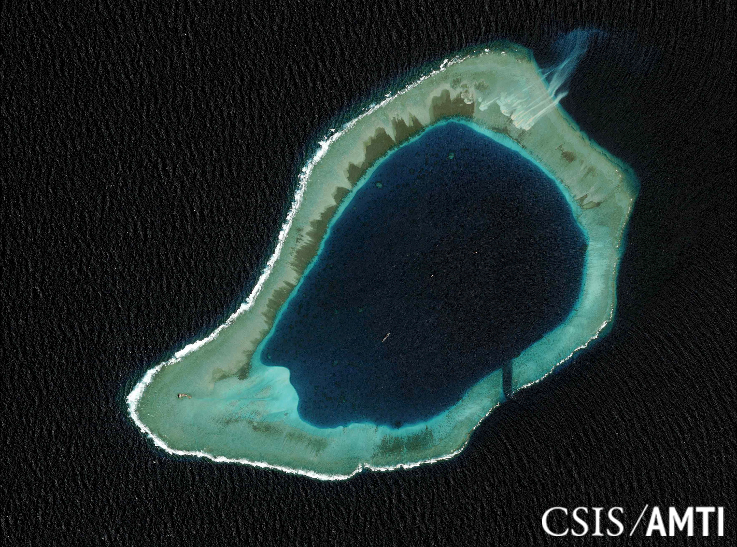 Subi reef, located in the disputed Spratly Islands in the South China Sea, is shown in this file handout CSIS Asia Maritime Transparency Initiative satellite image