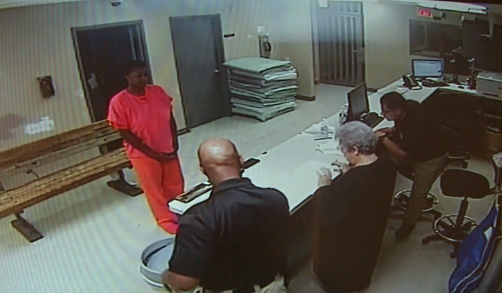 In this undated file image made from video provided by the Waller County Sheriff's Department, Sandra Bland stands before a desk at Waller County Jail in Hempstead, Texas. (Waller County Sheriff's Department/AP)