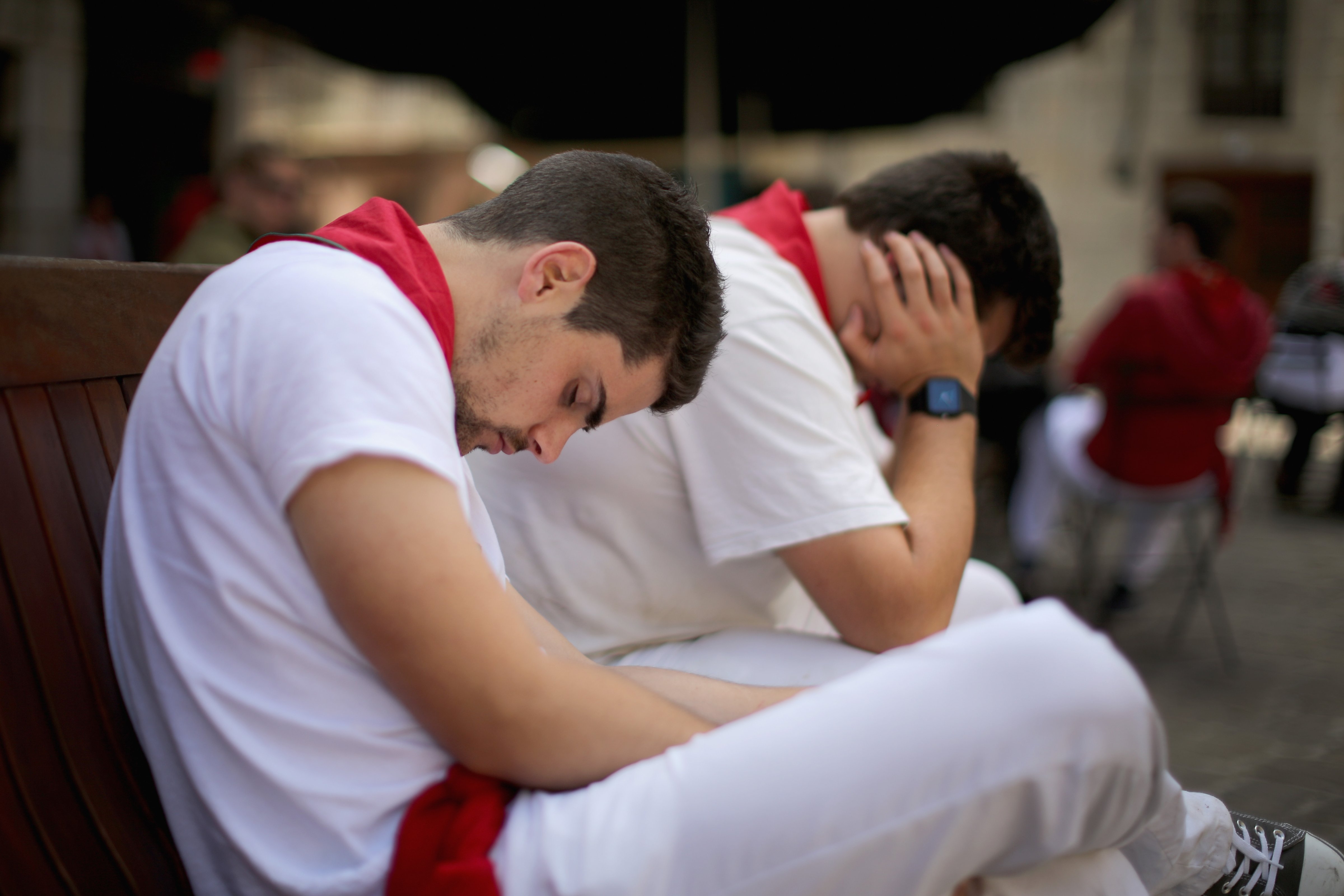 Revellers take an afternoon siesta sleeping off the effects of partying during the fourth day of the San Fermin Running Of The Bulls festival, on July 9, 2014 in Pamplona, Spain. (Christopher Furlon/Getty Images)
