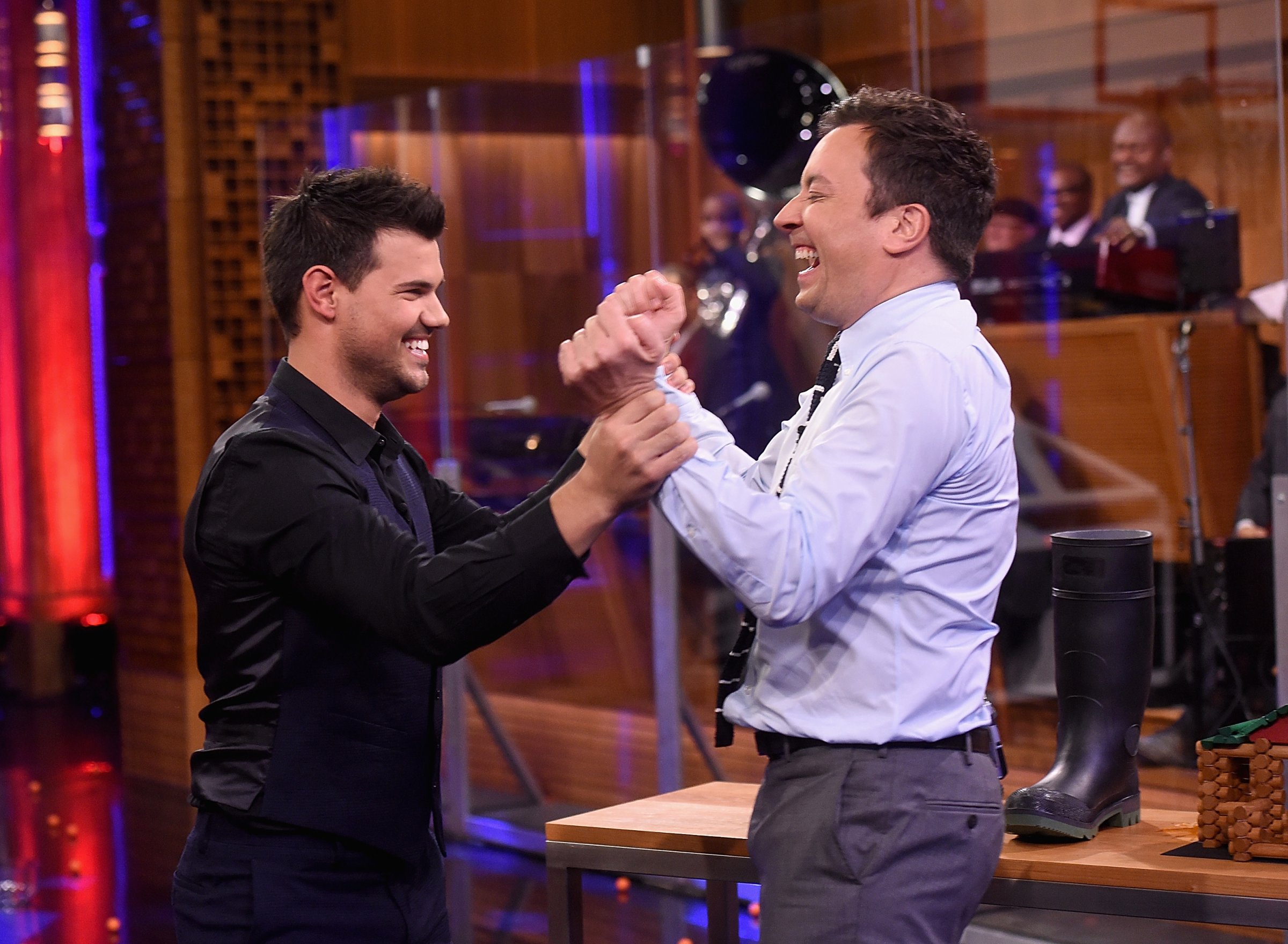 Taylor Lautner and host Jimmy Fallon during a segment on "The Tonight Show Starring Jimmy Fallon" at NBC Studios on March 31, 2016 in New York City.