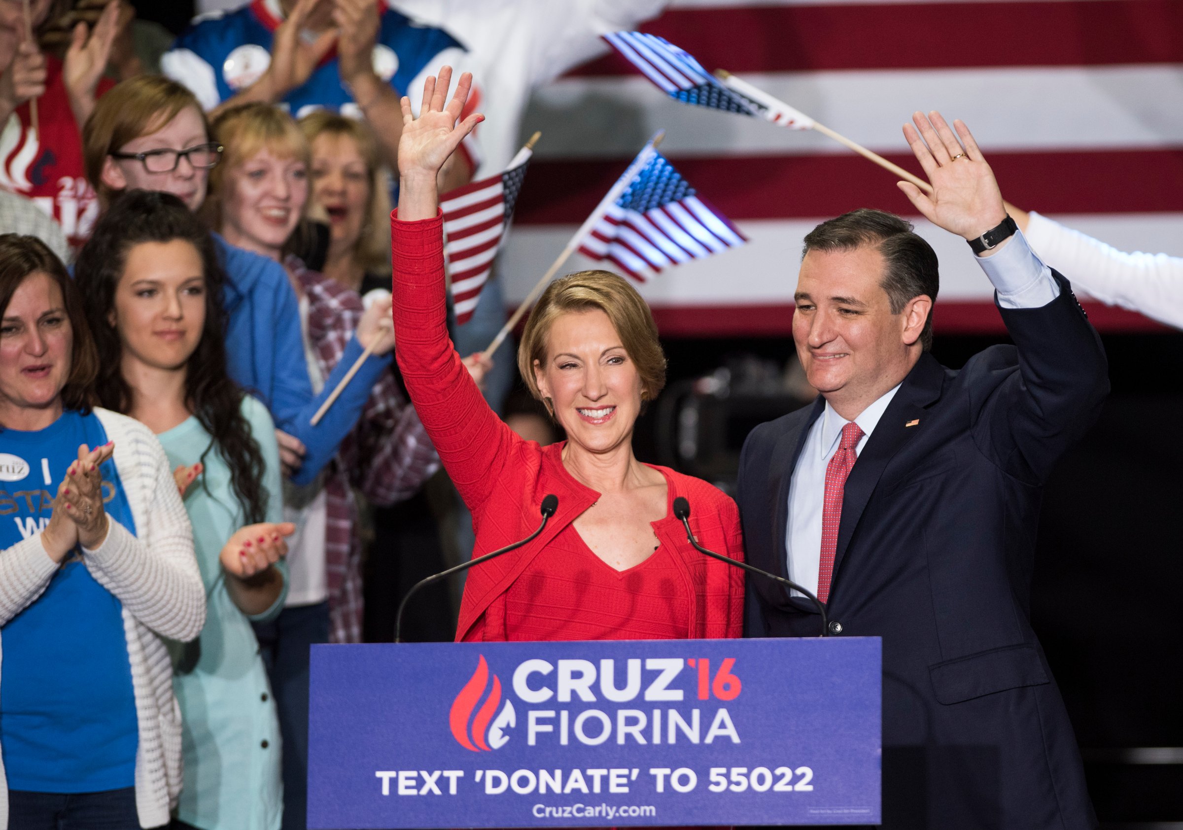 Republican presidential candidate Sen. Ted Cruz (R-TX) (R) greets supporters with former Hewlett-Packard chief executive Carly Fiorina at a campaign rally in the Pavilion at the Pan Am Plaza in Indianapolis on April 27, 2016.