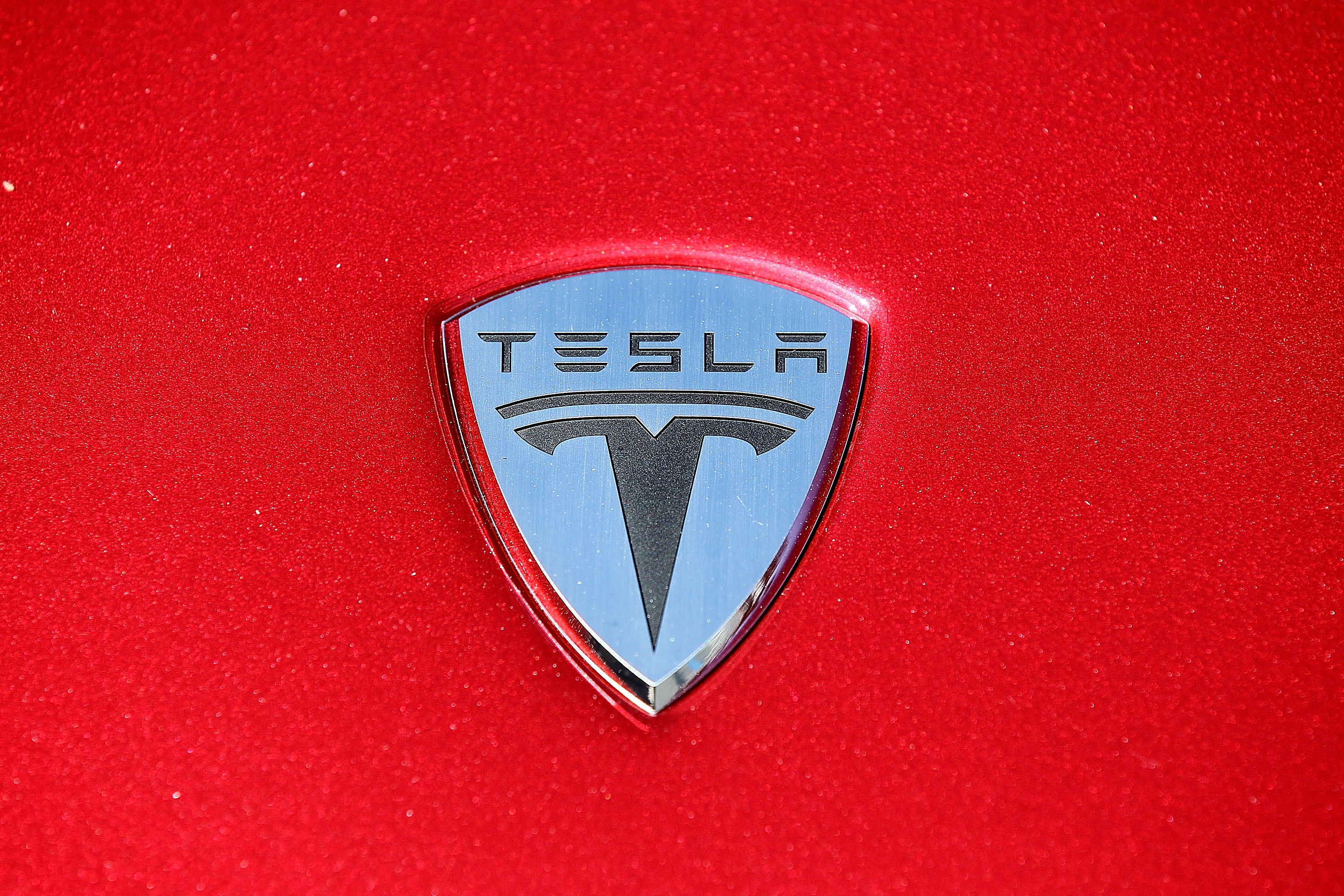 The Tesla Motors logo is seen on the hood of a car at Tesla Motors headquarters May 20, 2010 in Palo Alto, California. (Justin Sullivan/Getty Images)