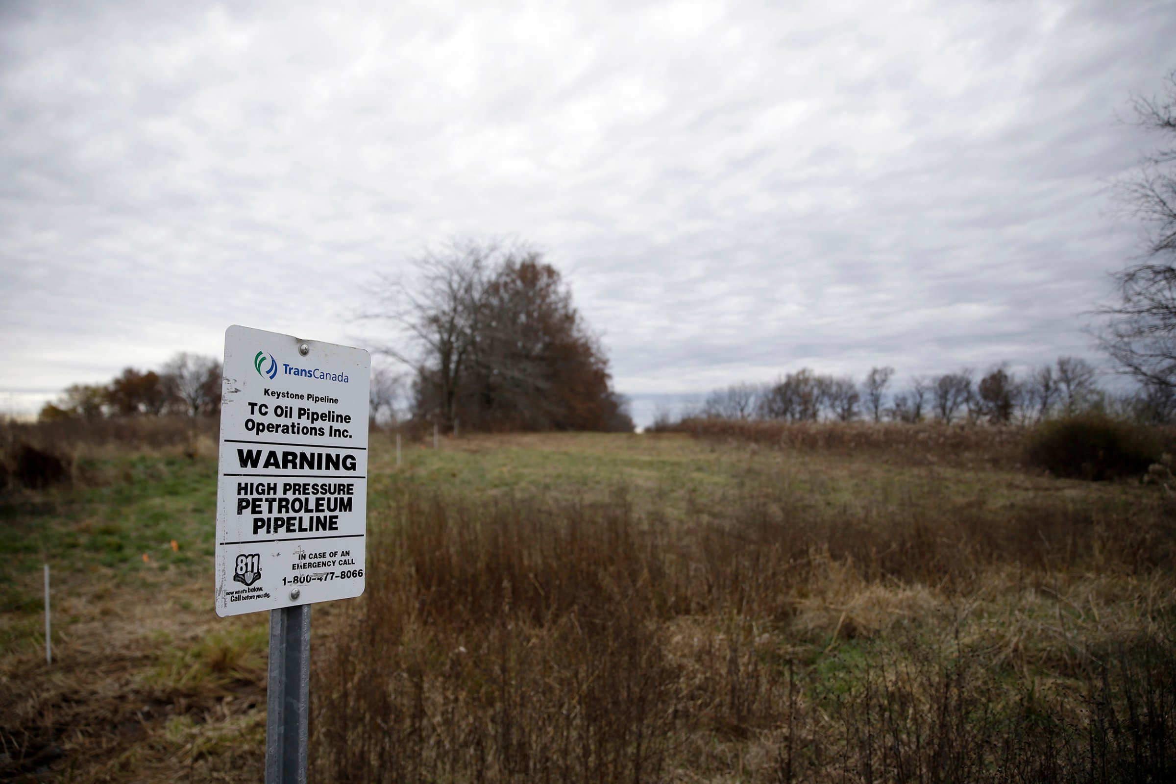 A sign marking the location of the TransCanada Keystone underground oil pipeline in Moberly, Mo, on Nov. 20, 2015.