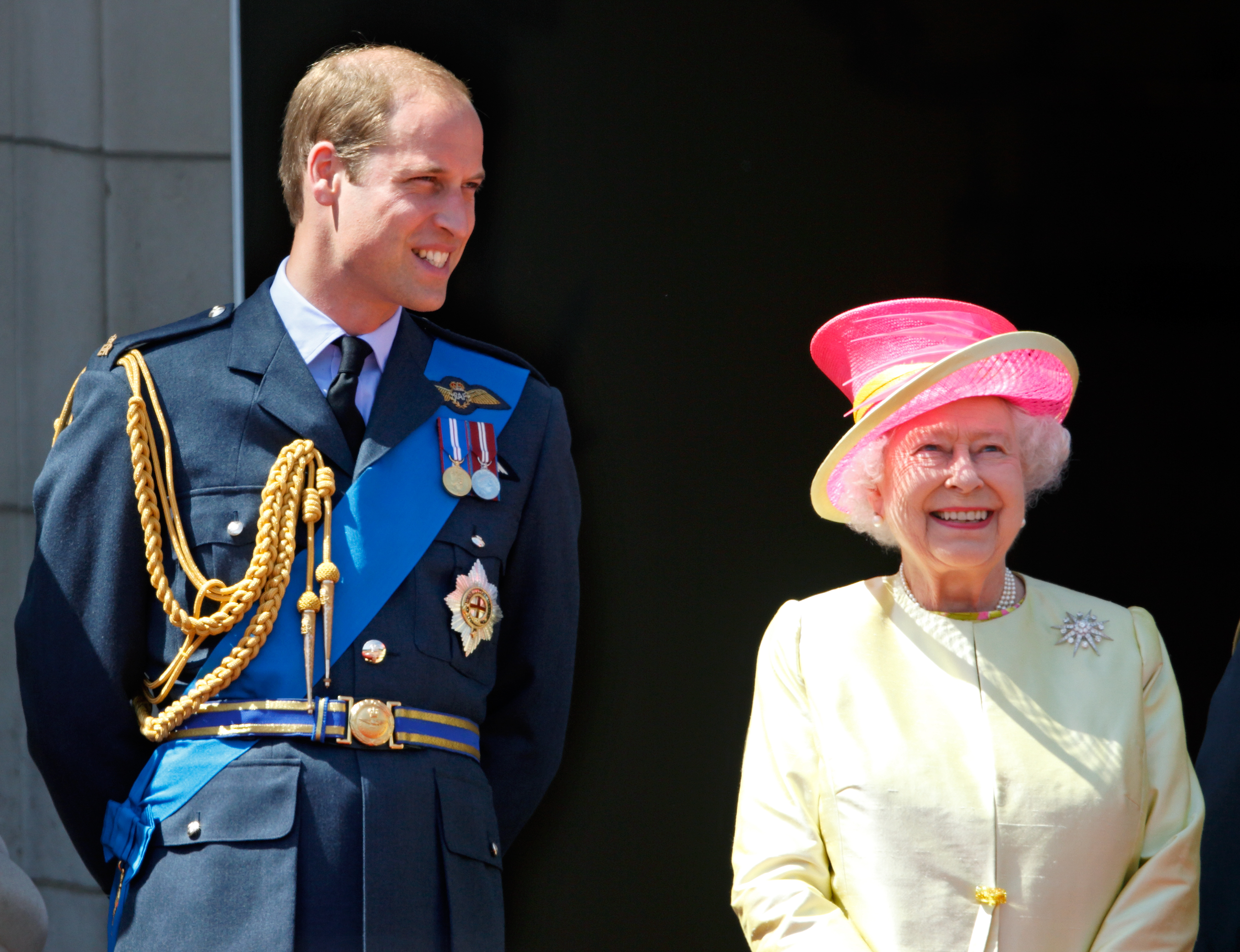 Prince William, Duke of Cambridge and Queen Elizabeth II watch a flypast of Spitfire &amp; Hurricane aircraft from the balcony of Buckingham Palace to commemorate the 75th Anniversary of The Battle of Britain on July 10, 2015 in London, England. (Max Mumby/Indigo&mdash;Getty Images)