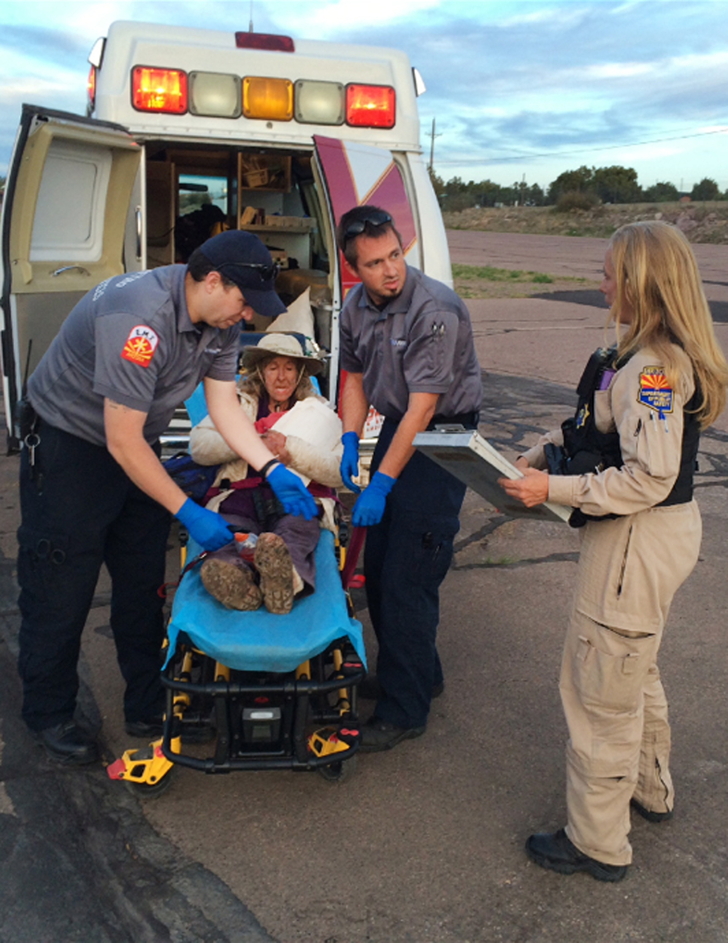 This photo provided by Arizona Department of Public Safety shows an ambulance taking Ann Rodgers, 72 , to safety on April 9, 2016 after she was lost in the forest for nine days.