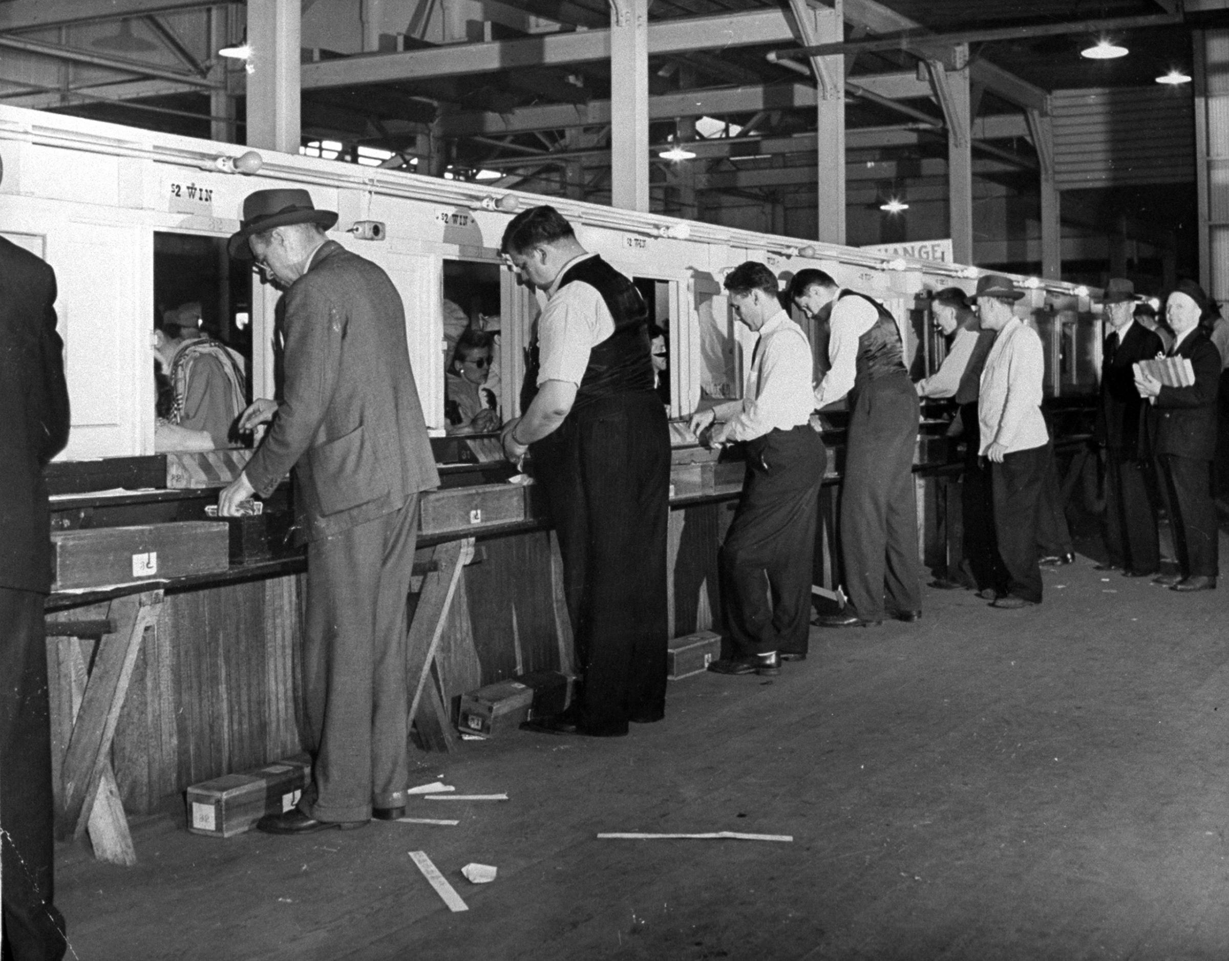 People placing bets on the Kentucky Derby, 1945.