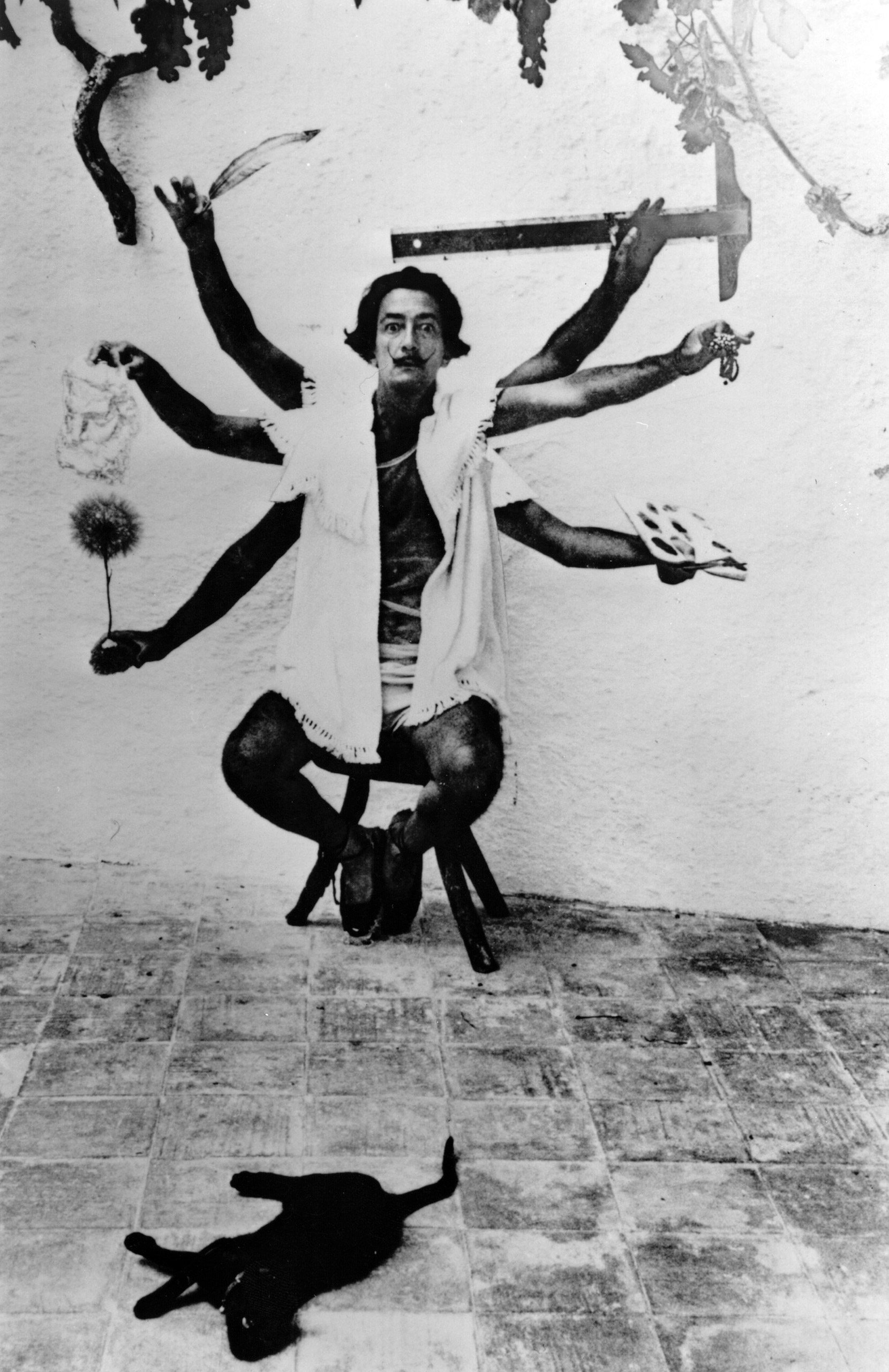 Salvador Dali in a multiple exposure pose at his home in Cadaques on the Spanish Costa Brava. 1955.